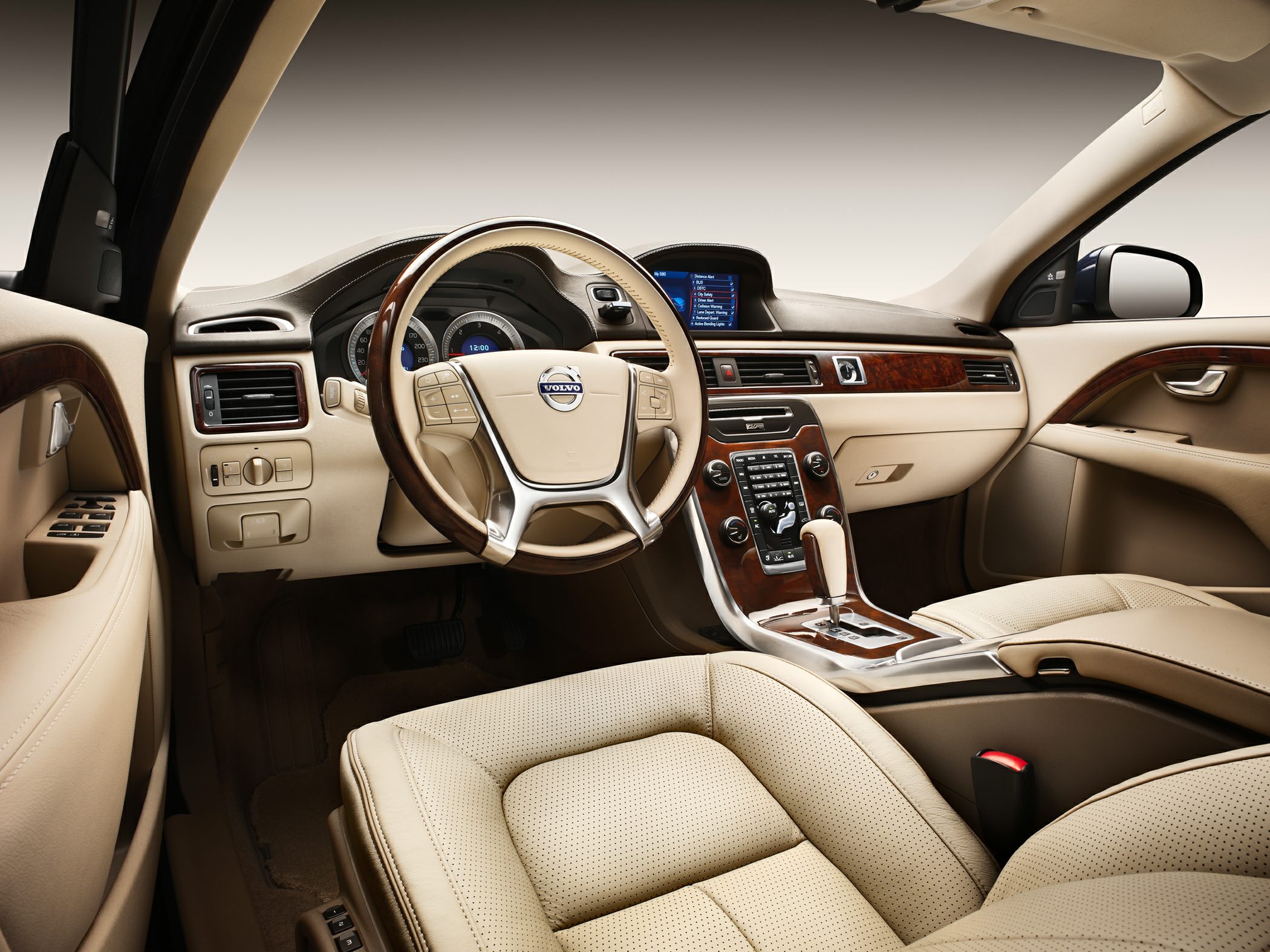 Luxury beige leather interior with wood trim and advanced dashboard