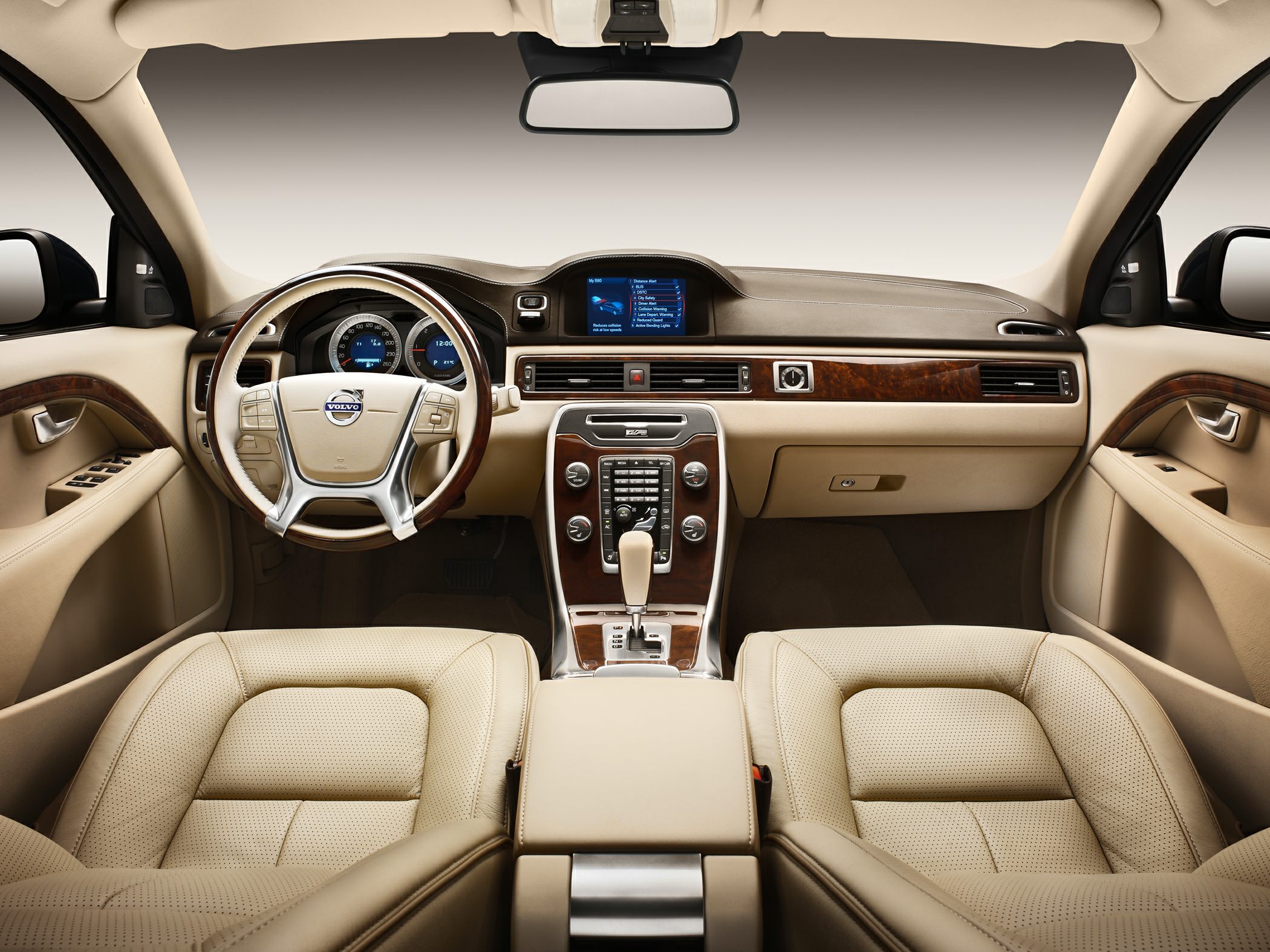 Beige leather interior with wood trim and multifunction steering wheel