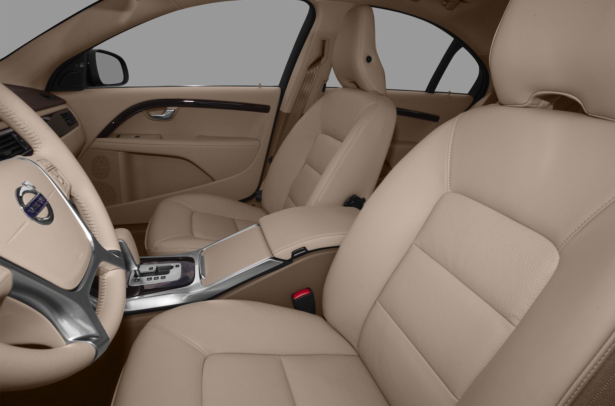 Beige leather seats and sleek center console with gear shift