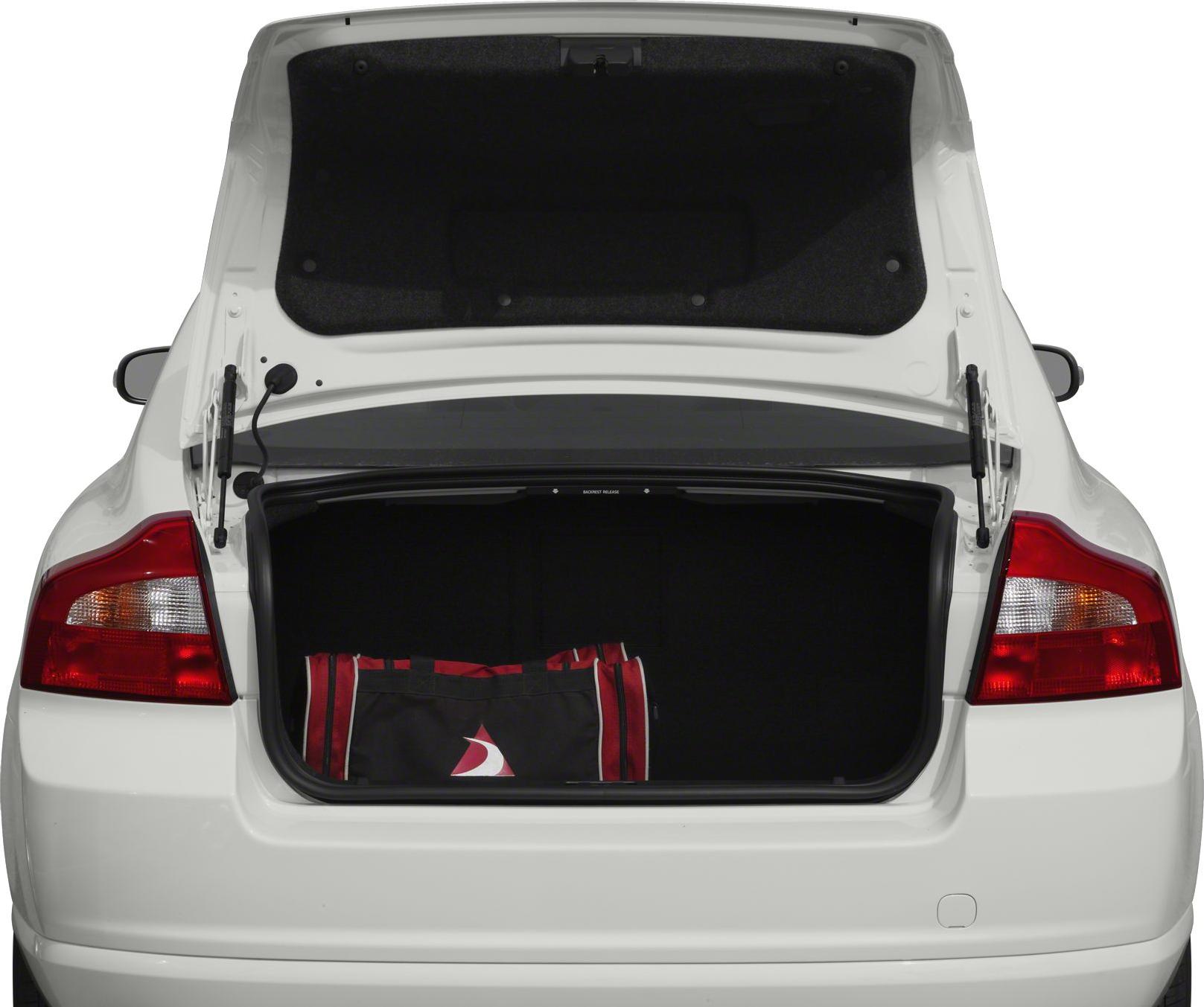 Open trunk space with a red and black bag inside