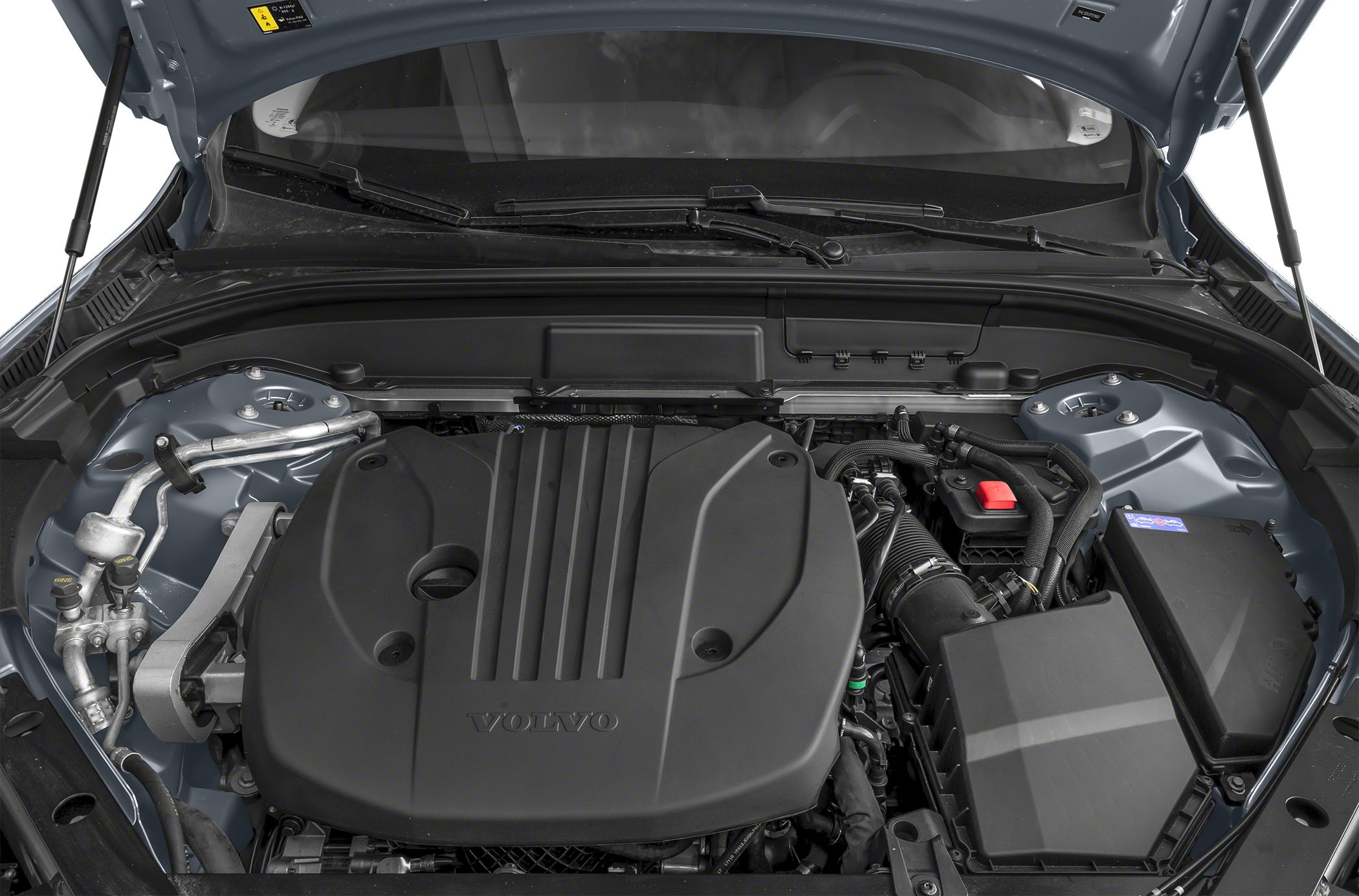 Engine bay with Volvo branded engine cover and surrounding components