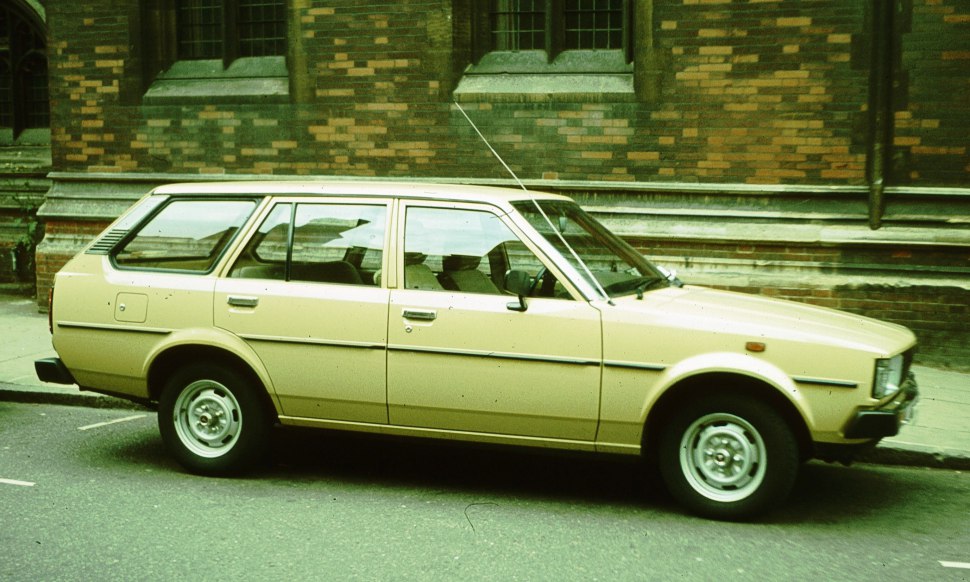 Boxy station wagon with four doors and large windows in side profile