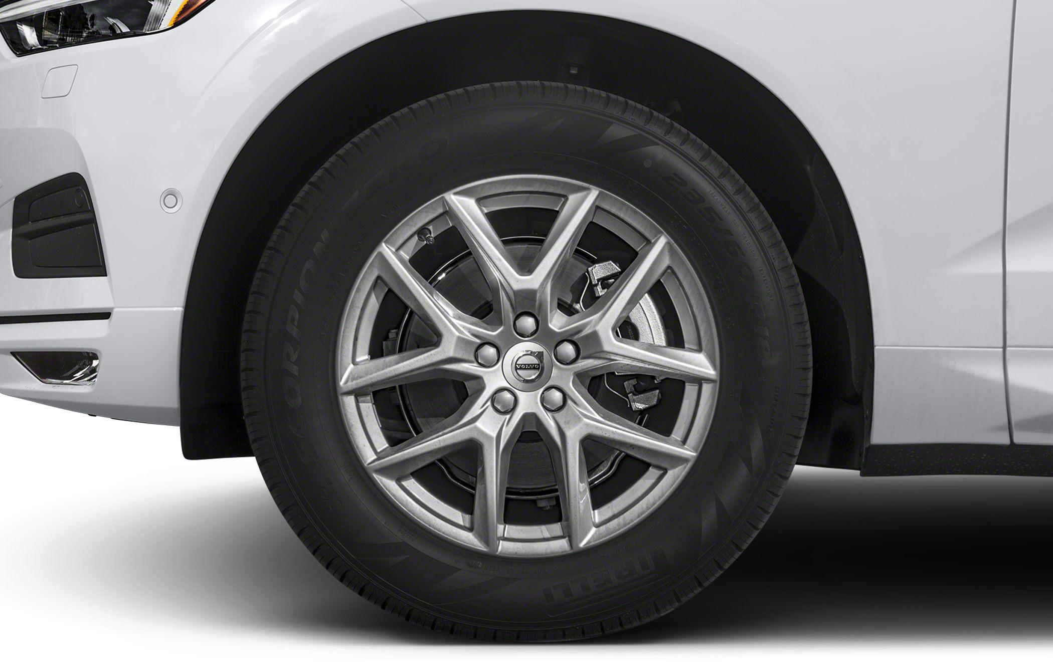 Close-up of alloy wheel and tire with visible brake disc