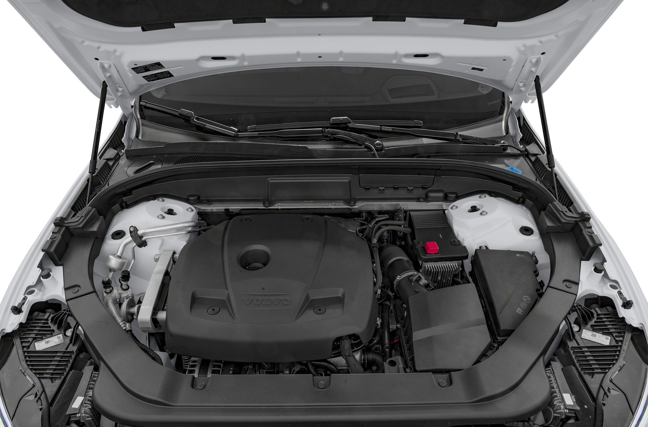 Engine compartment with black engine cover under open hood