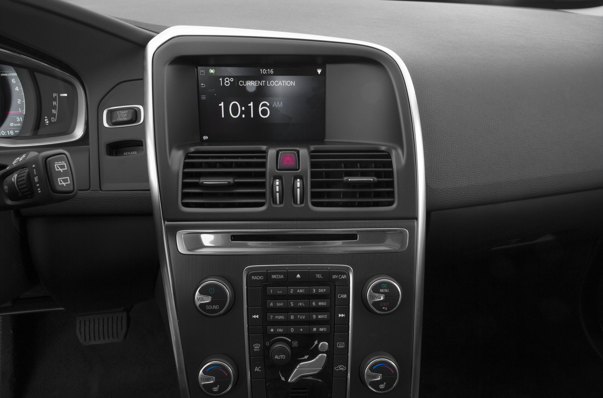 Center console with infotainment display and climate control knobs.