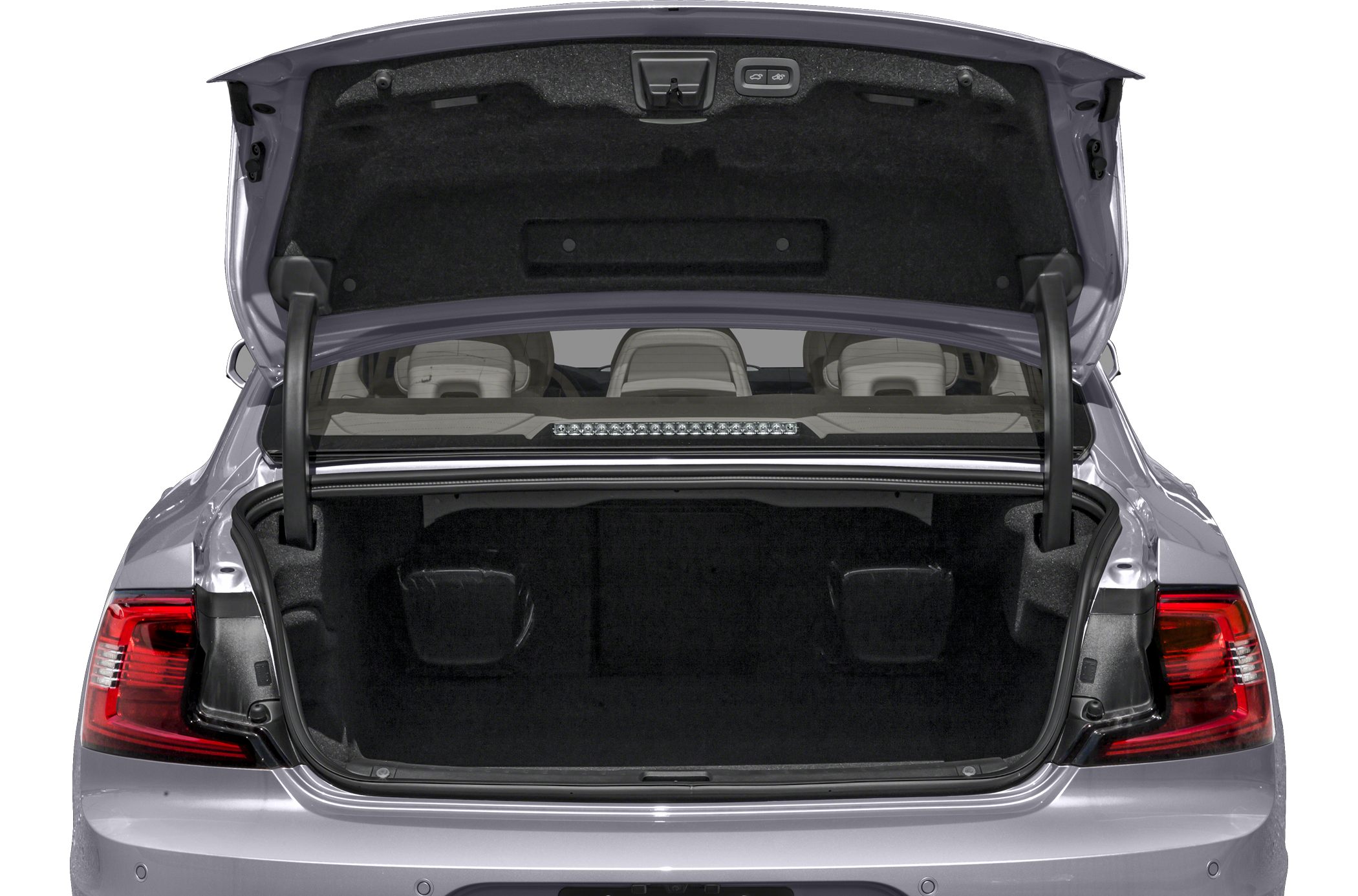 Open trunk of a modern sedan with spacious interior and visible rear lights