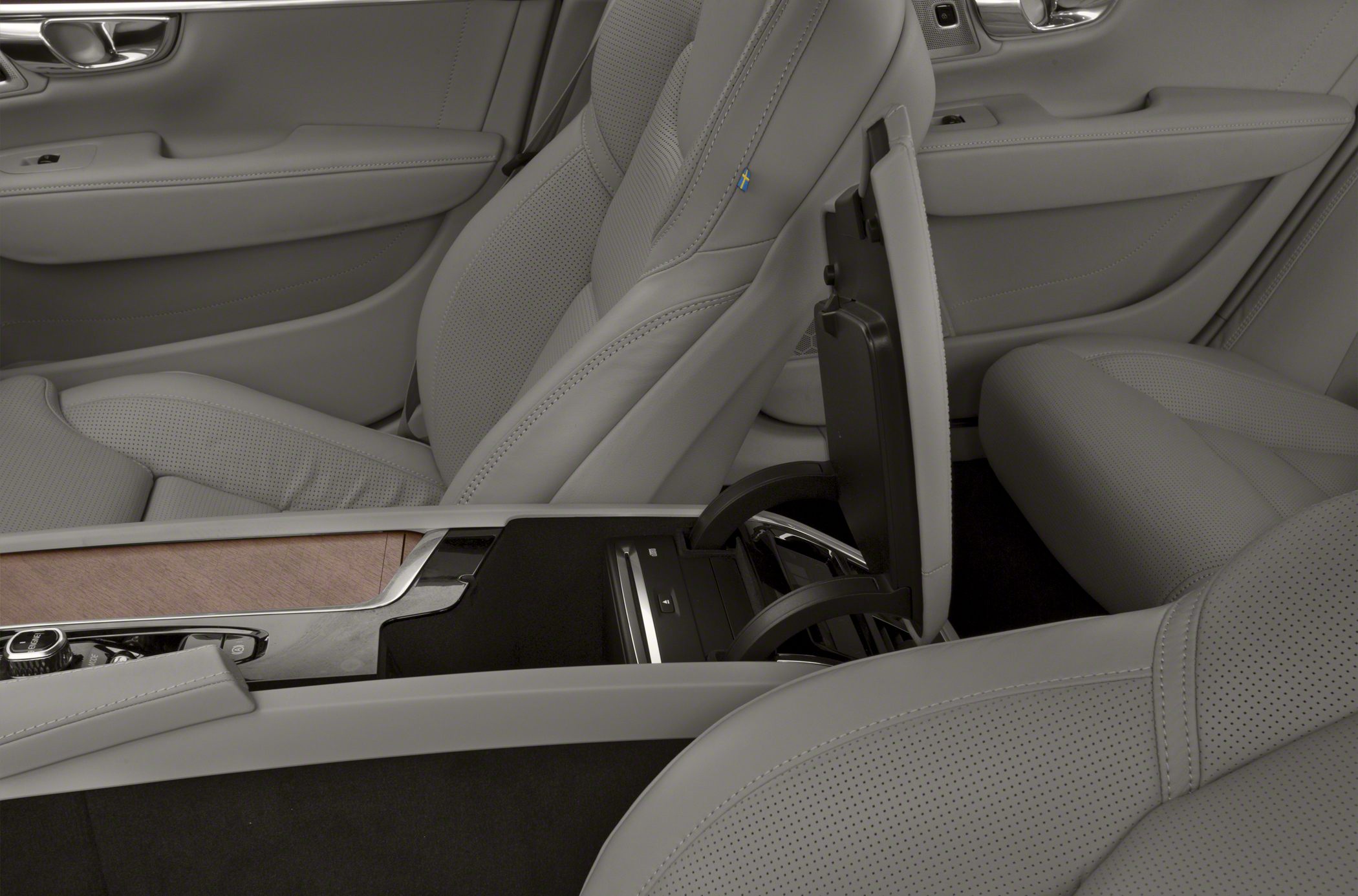 Gray perforated leather seats with rear center armrest storage