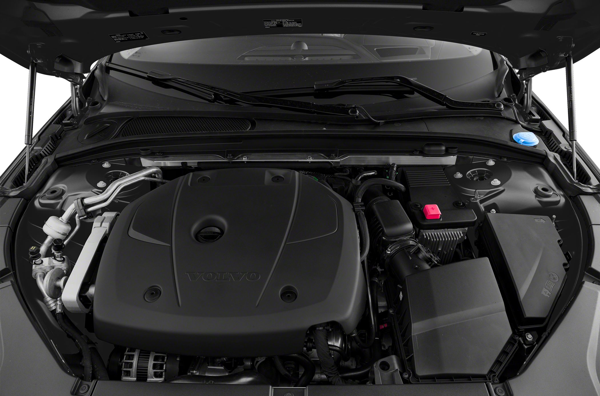 Engine compartment with large engine cover and various components visible
