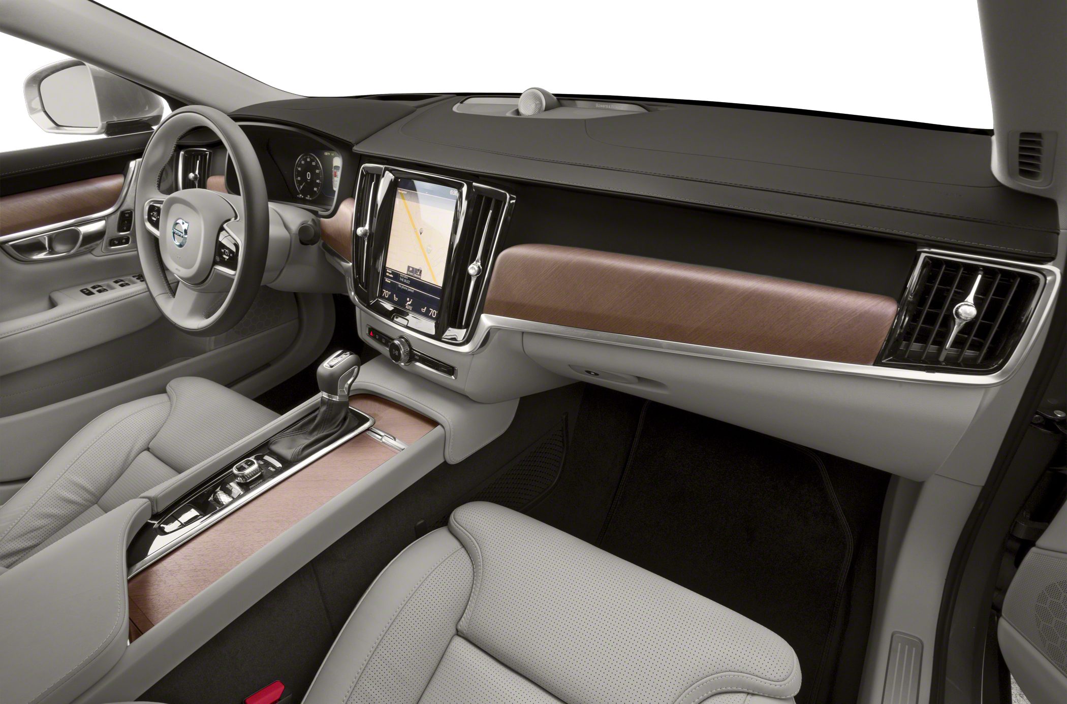 Luxury car interior with dashboard and center console featuring wood trim and infotainment screen