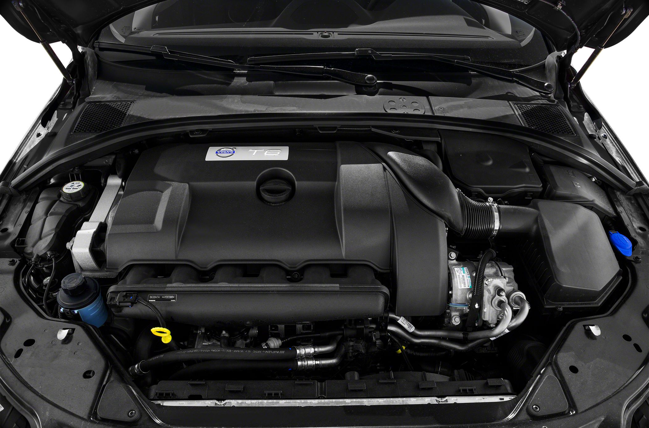 Close-up of T6 engine bay with cover, air intake hose, and components