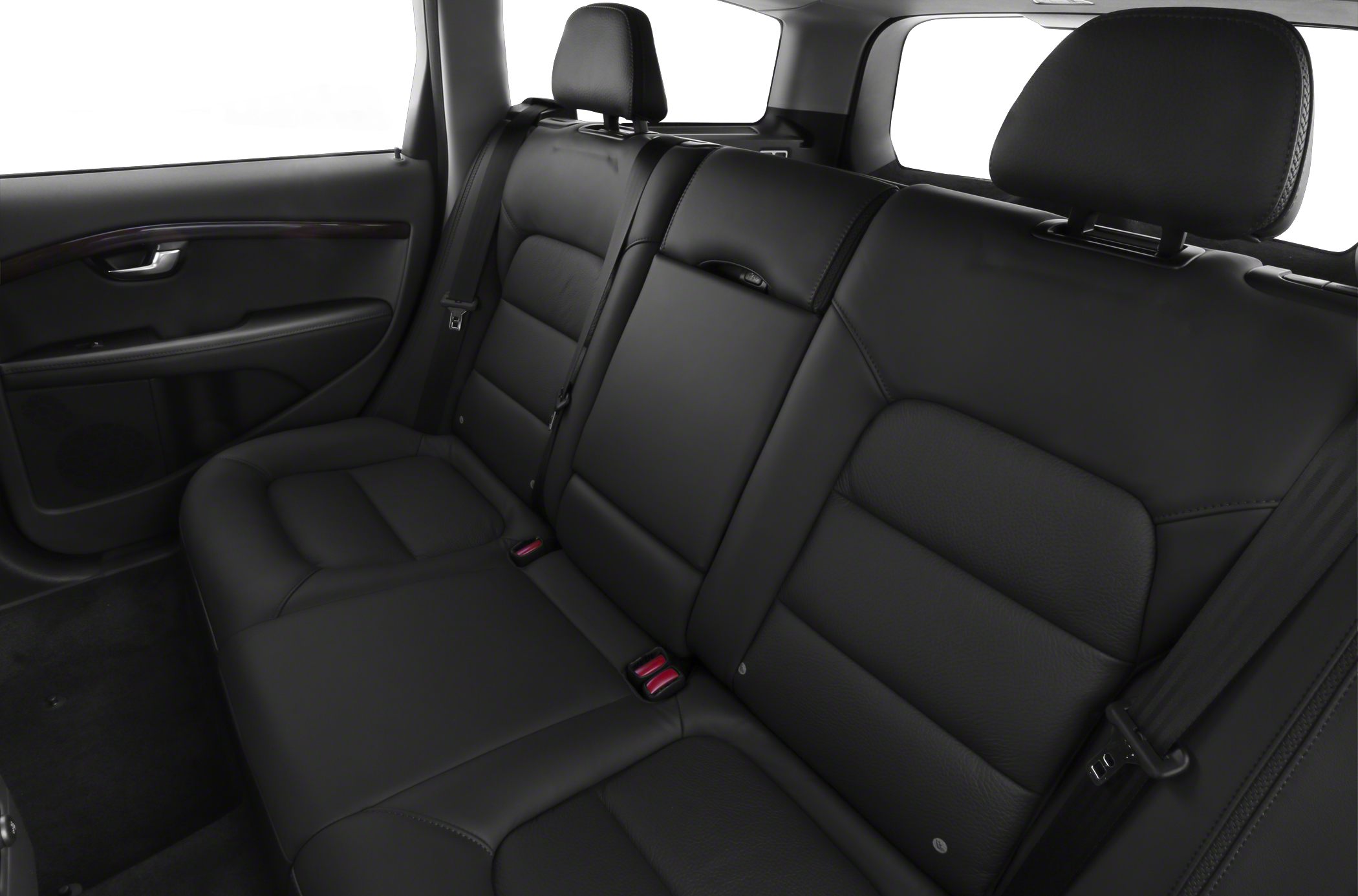Black leather rear seat interior with headrests and seatbelts