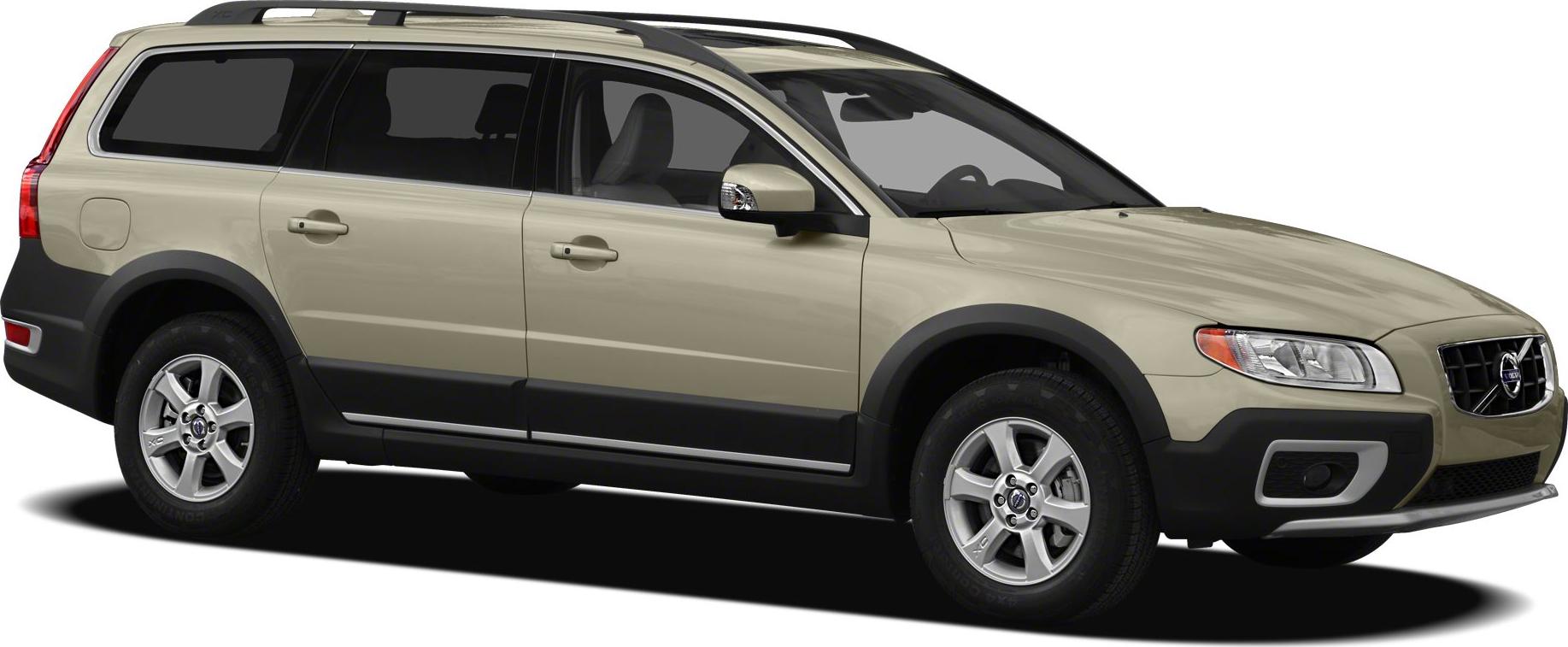 Beige station wagon with roof rails and alloy wheels