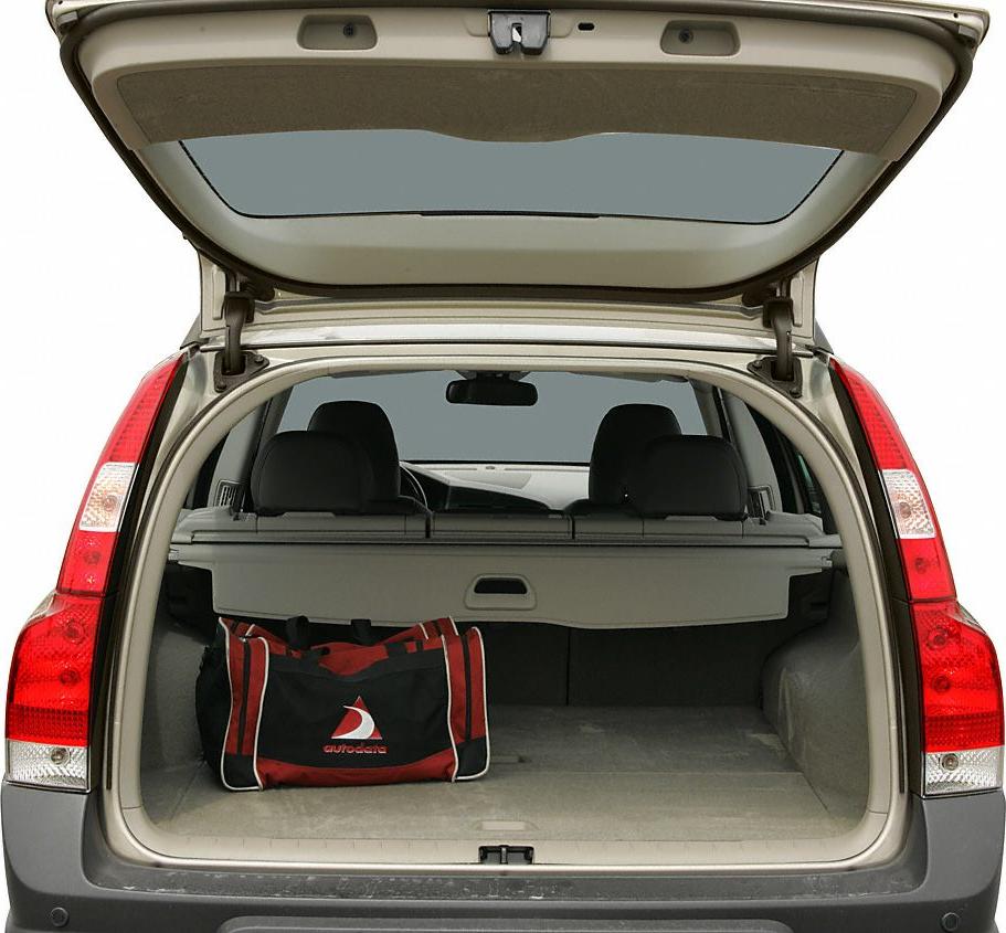 Open tailgate showing spacious rear cargo area with luggage bag