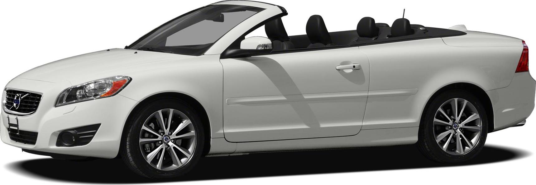 White convertible with roof down, alloy wheels, side profile view