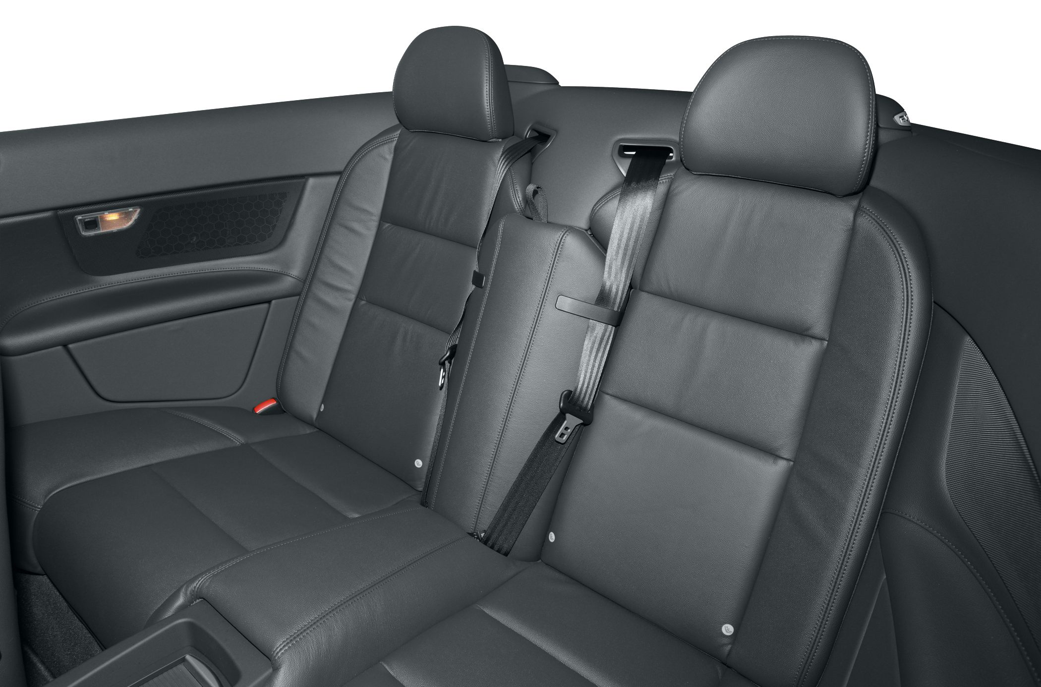 Rear leather seats with headrests and seat belts in a luxury coupe convertible.