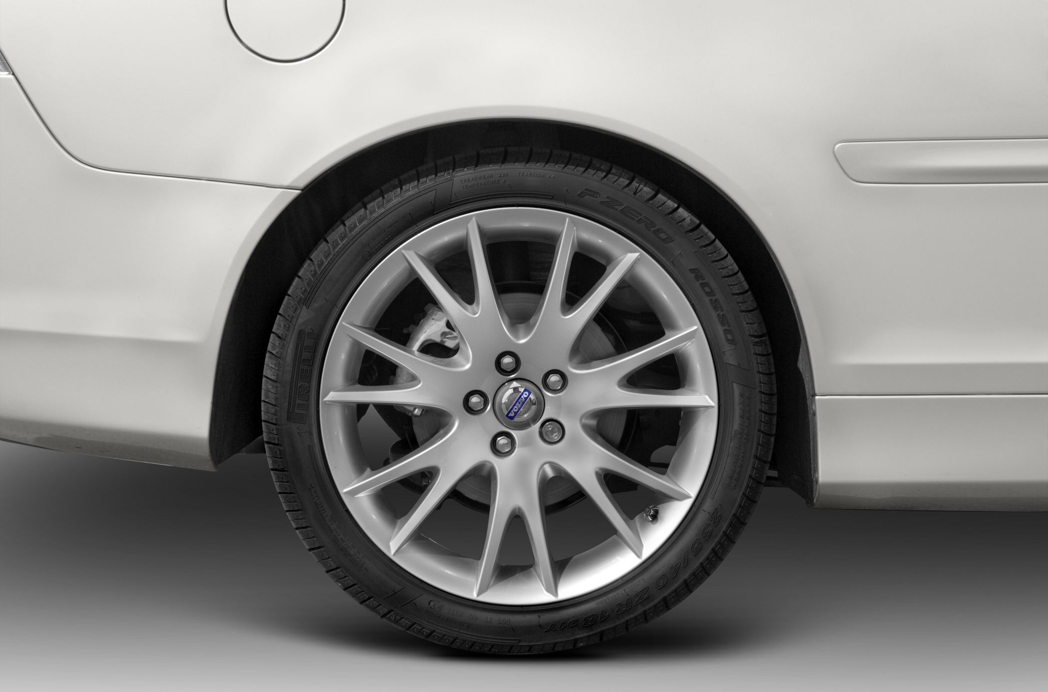 Close-up of alloy wheel with Pirelli P Zero Rosso tire and brake components