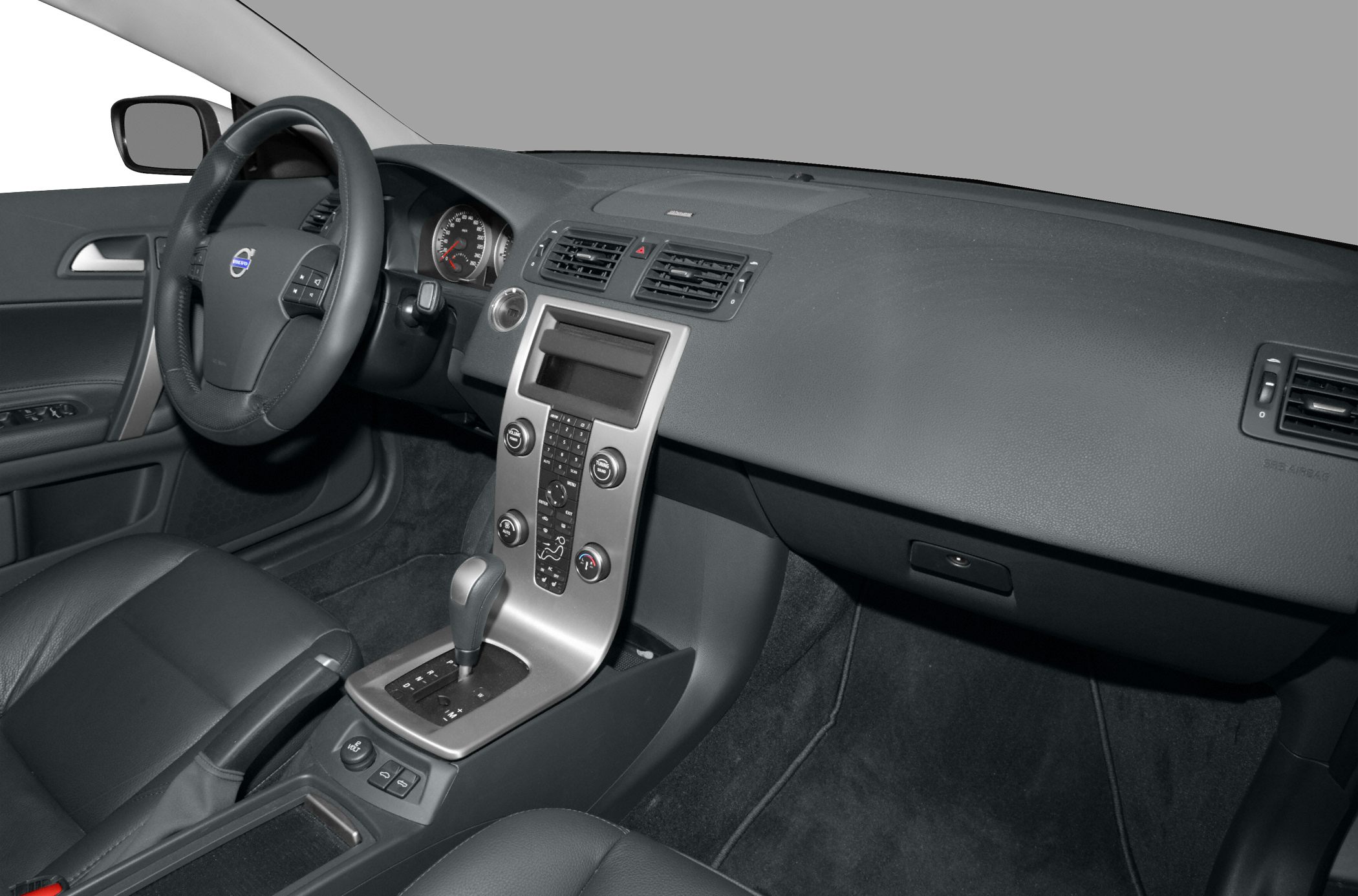 Dashboard and center console with gear shift and steering wheel