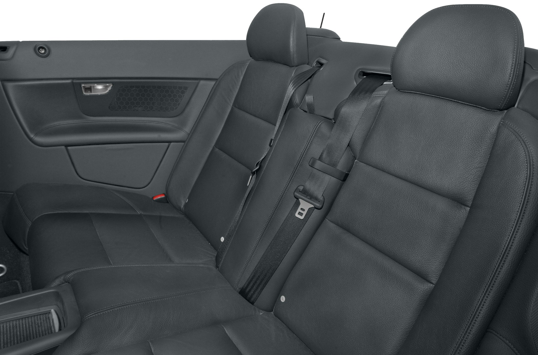 Rear black leather seats and seat belts in convertible car interior