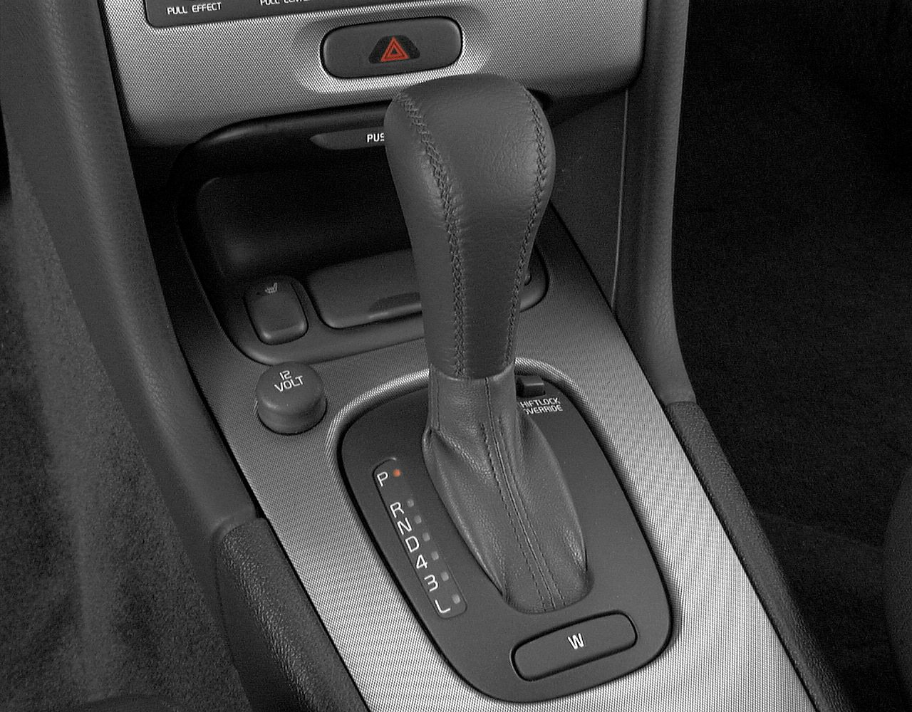Automatic transmission gear shift lever with control buttons