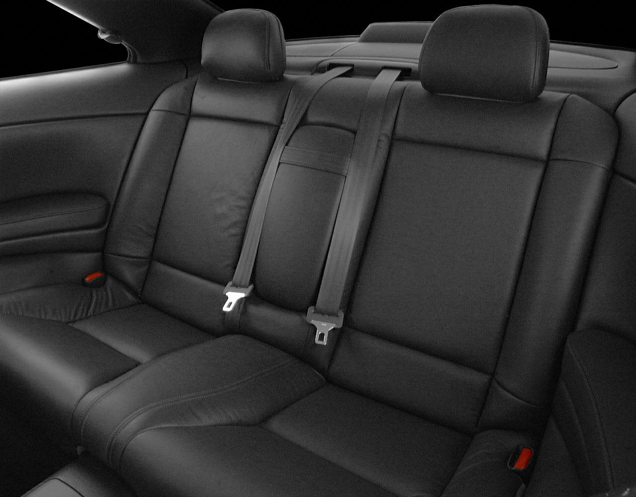 Black leather rear seats with seat belts and headrests