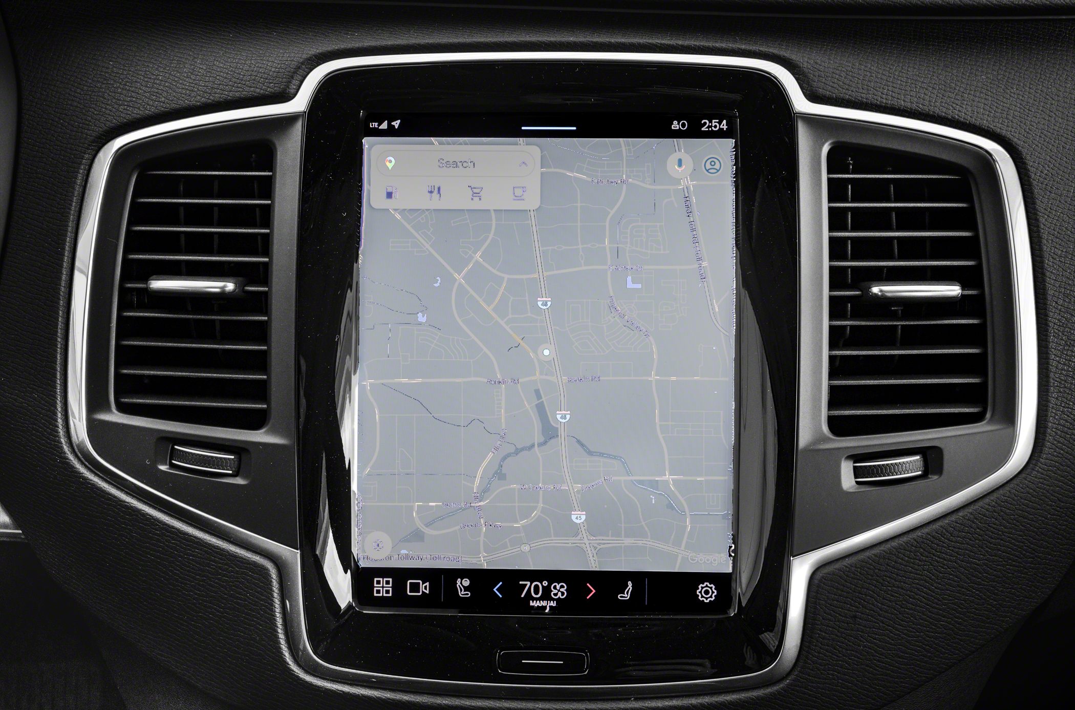 Digital infotainment screen with navigation and dual air vents