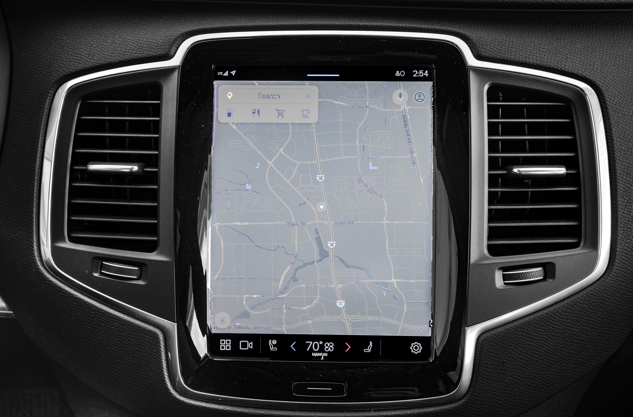 Touchscreen navigation and dual air vents with integrated climate controls