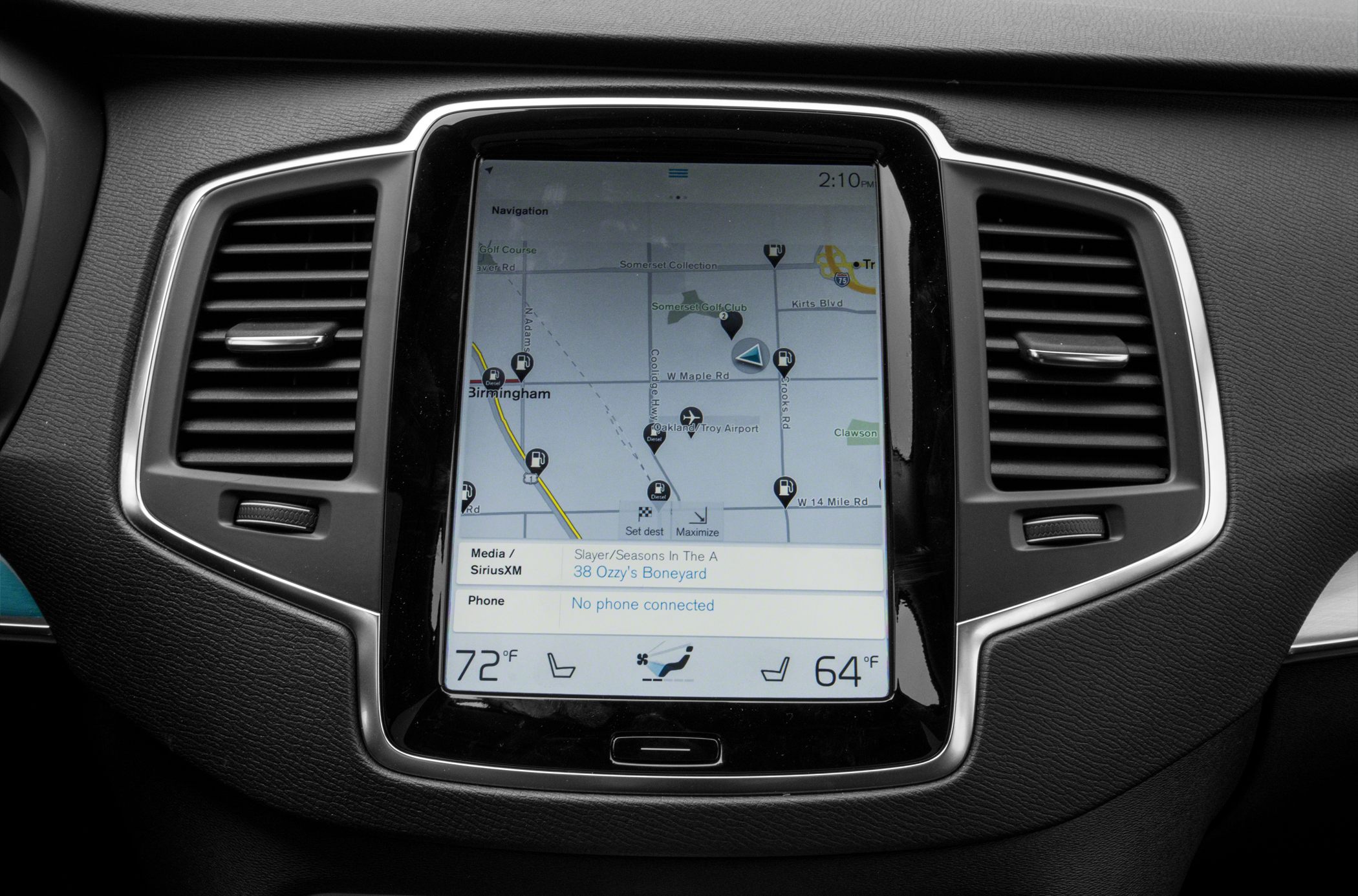 Central touchscreen with navigation and dual climate control display