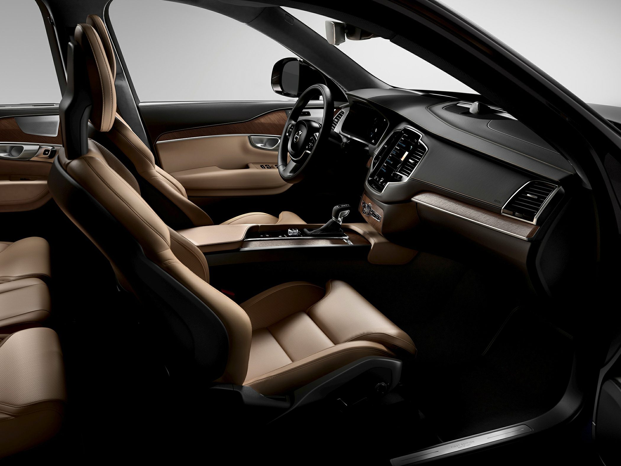 Premium leather seats and modern dashboard with wood trim