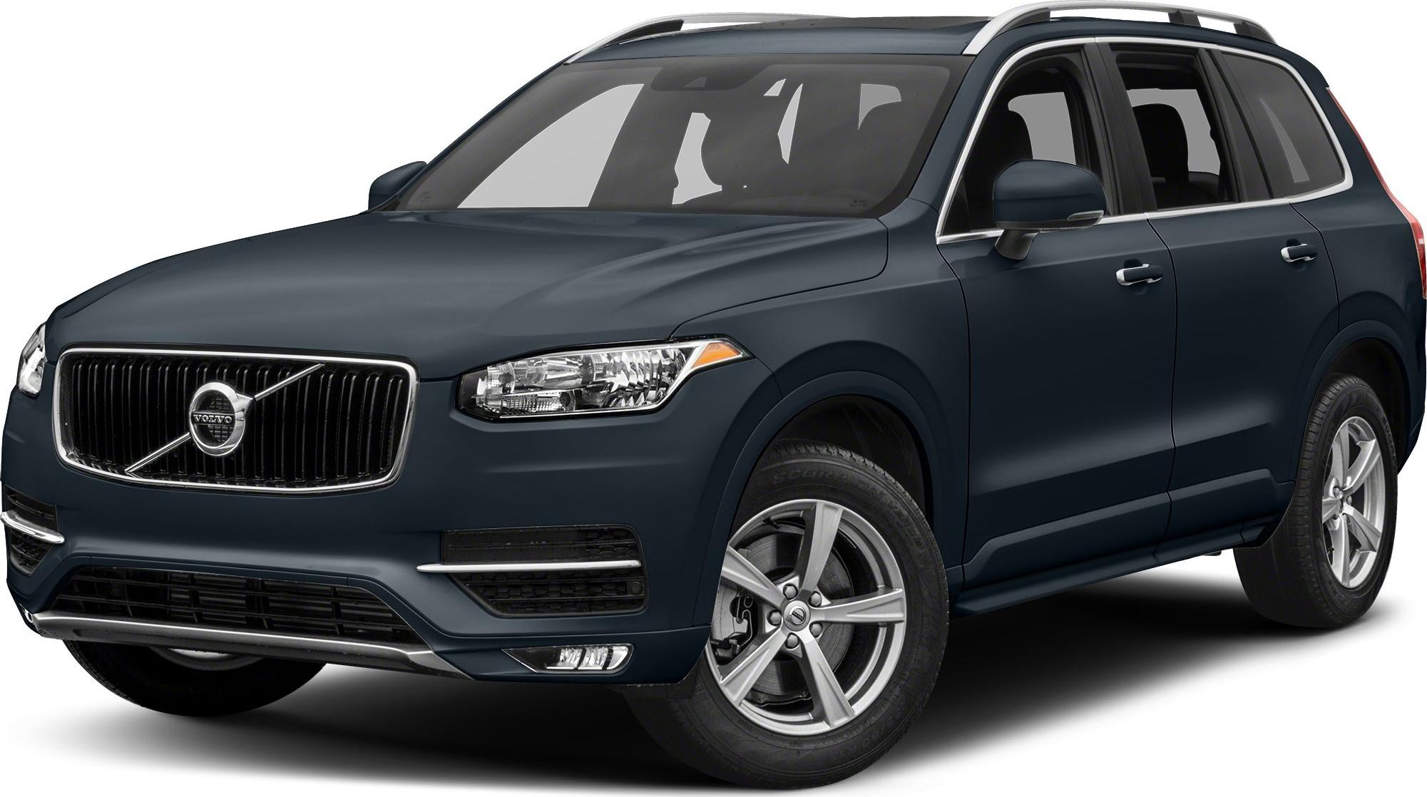 Front side view of large dark blue SUV with distinctive grille and alloy wheels