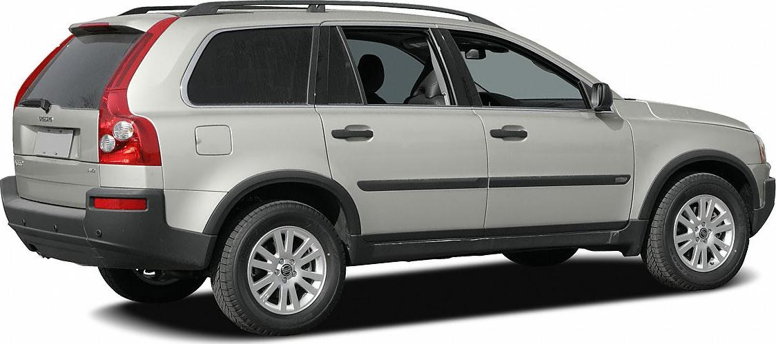 Side rear view of a mid-2000s SUV with distinct taillights and alloy wheels