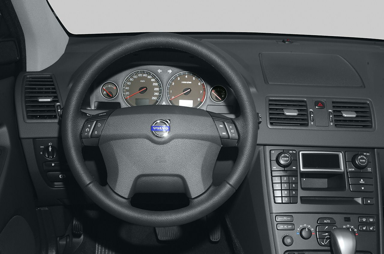 Steering wheel, instrument cluster, and center console close-up