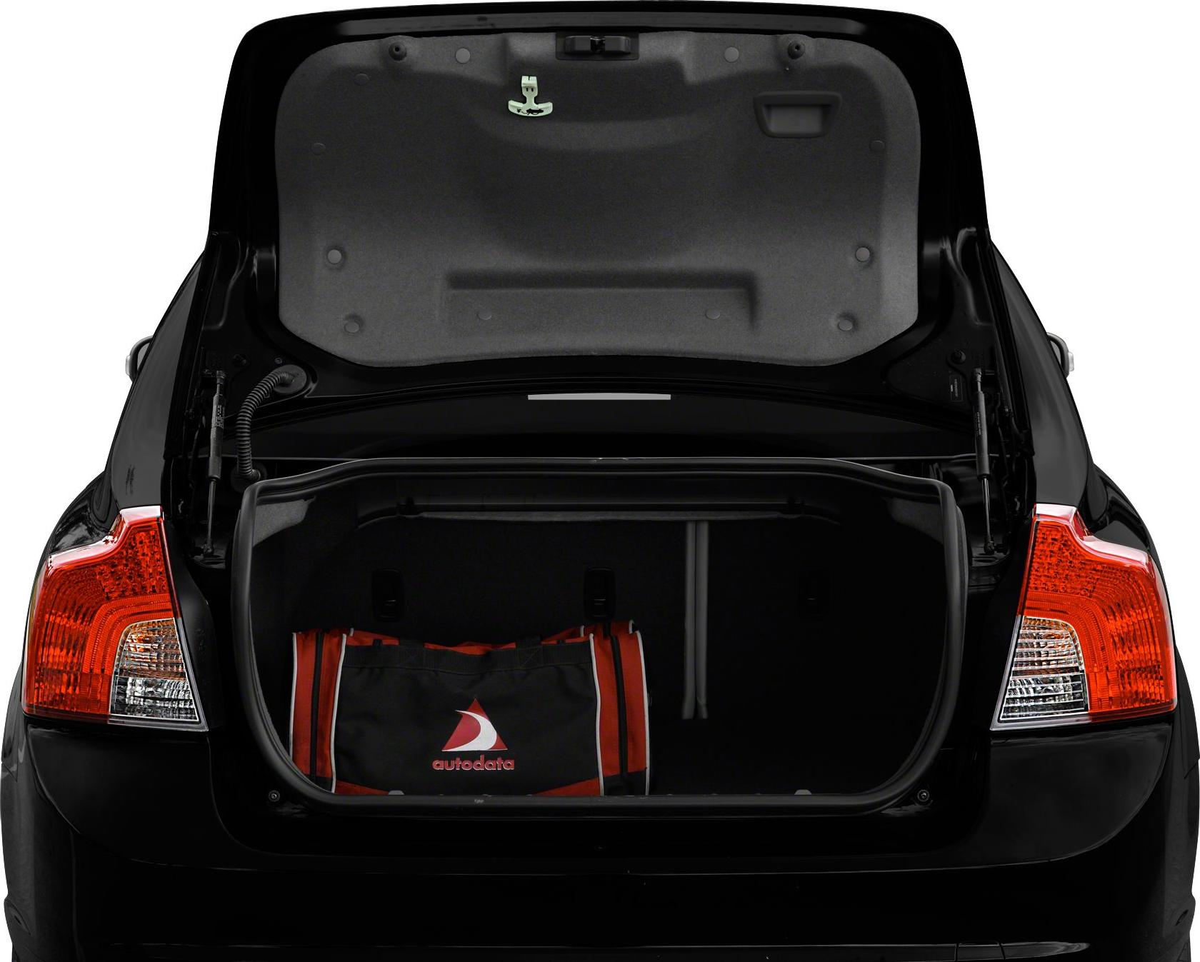 Open rear trunk and taillights of a sedan with a red and black bag inside