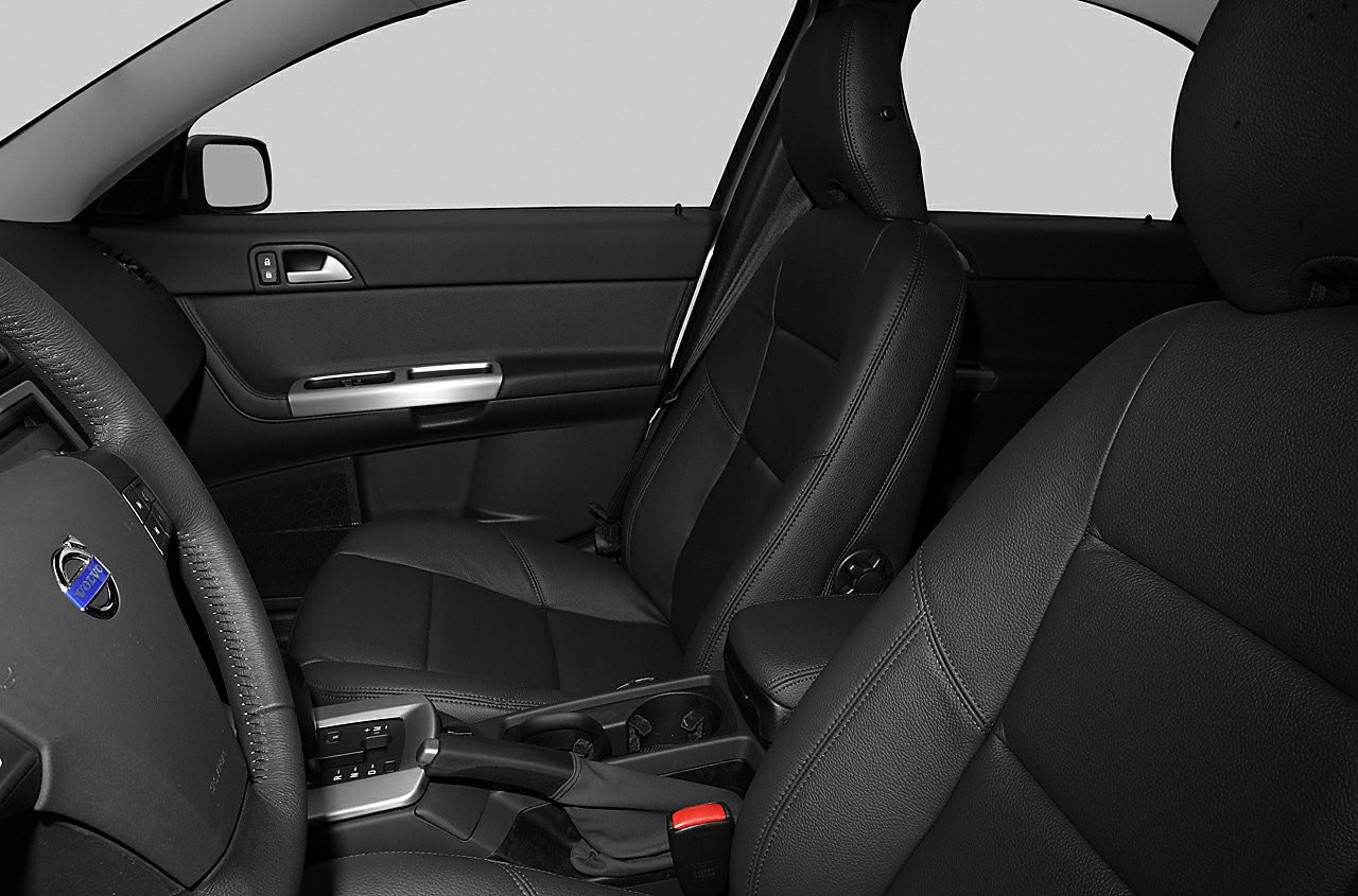 Black leather front seats and door panel in car interior
