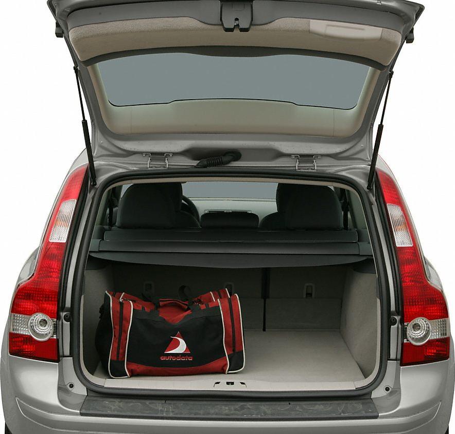 Open tailgate with spacious, clean cargo area and a red-black bag inside