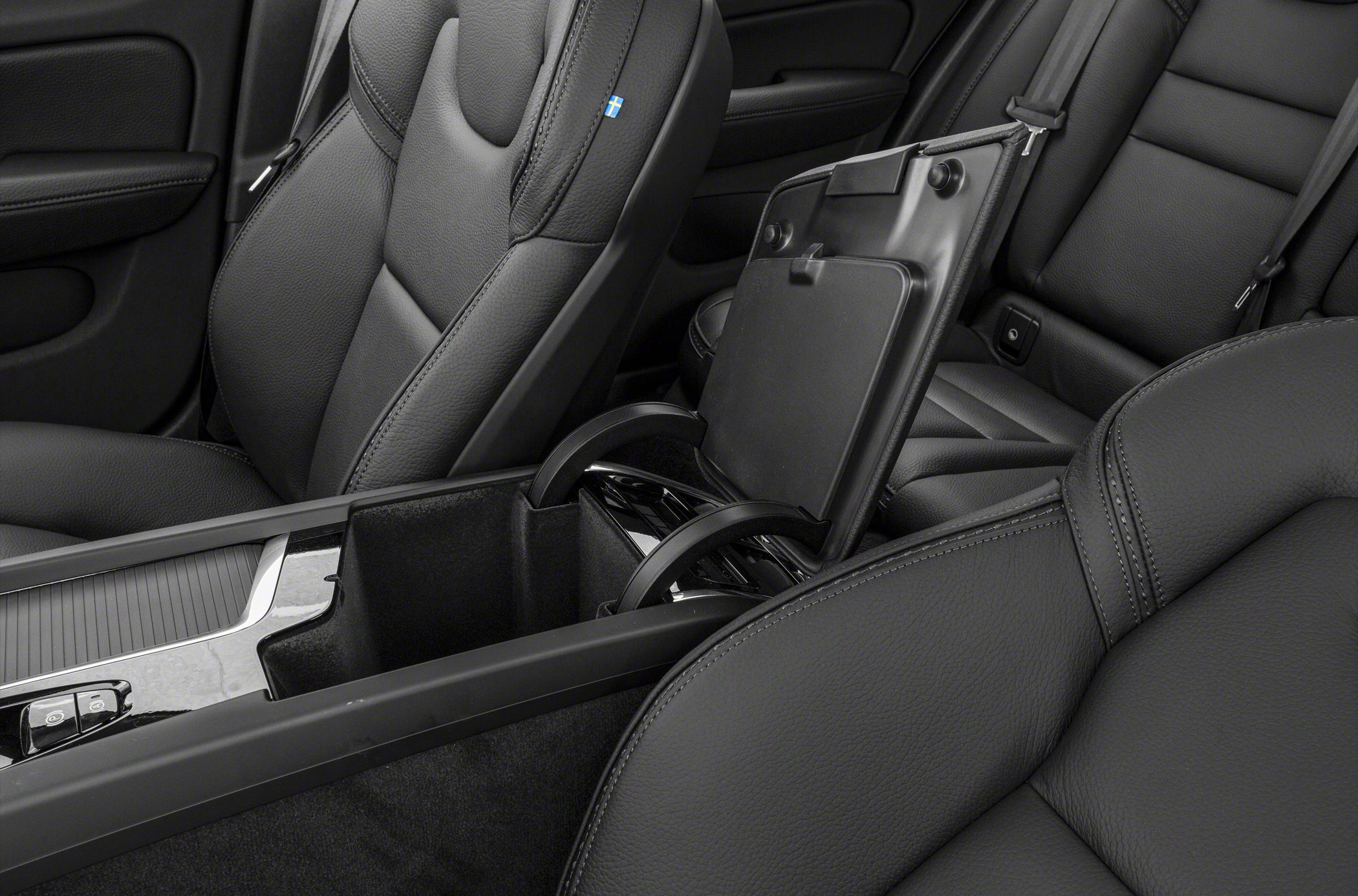 Leather seats and center console cup holders with armrest