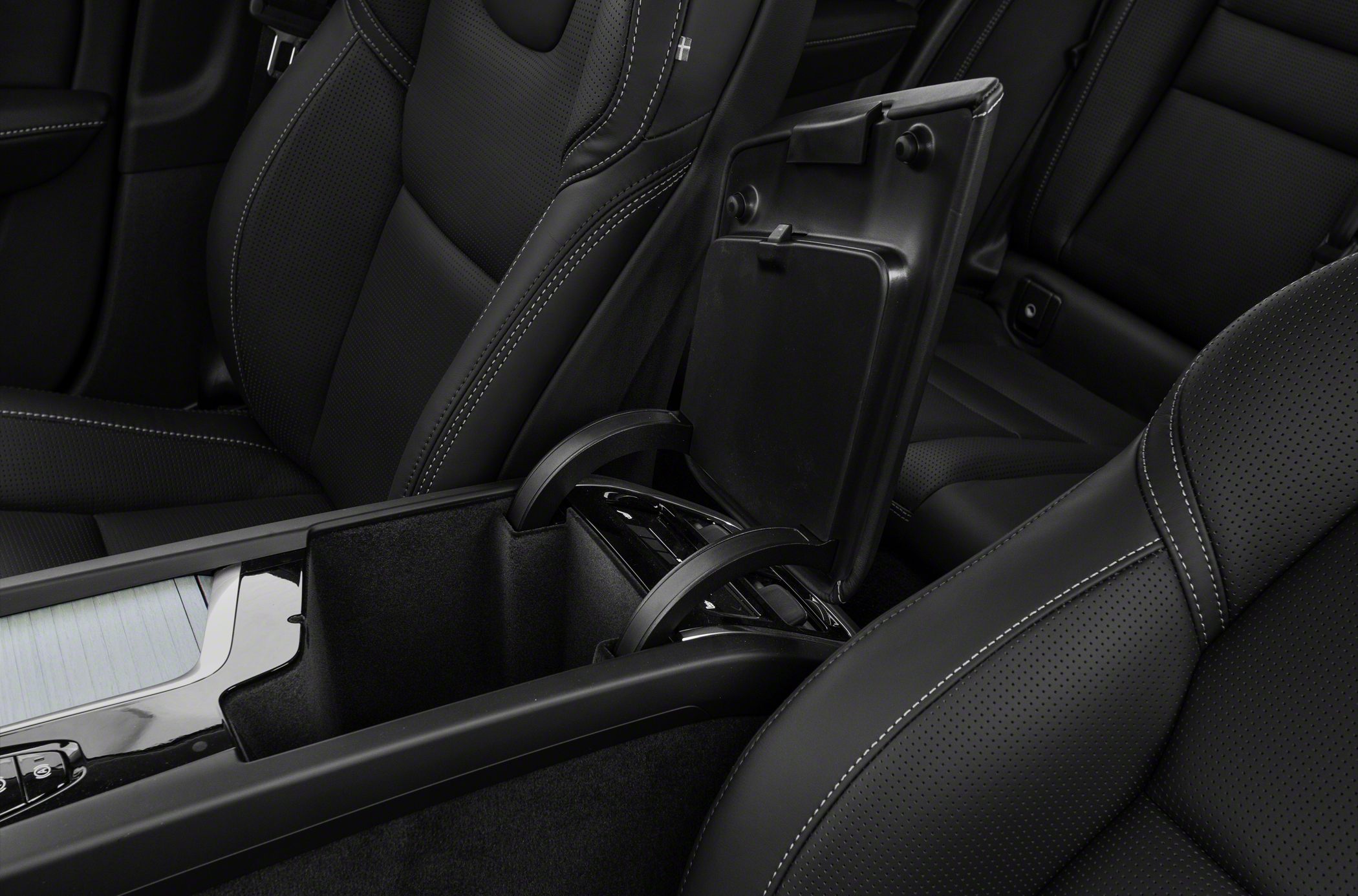 Center console storage and leather seats with stitching detail