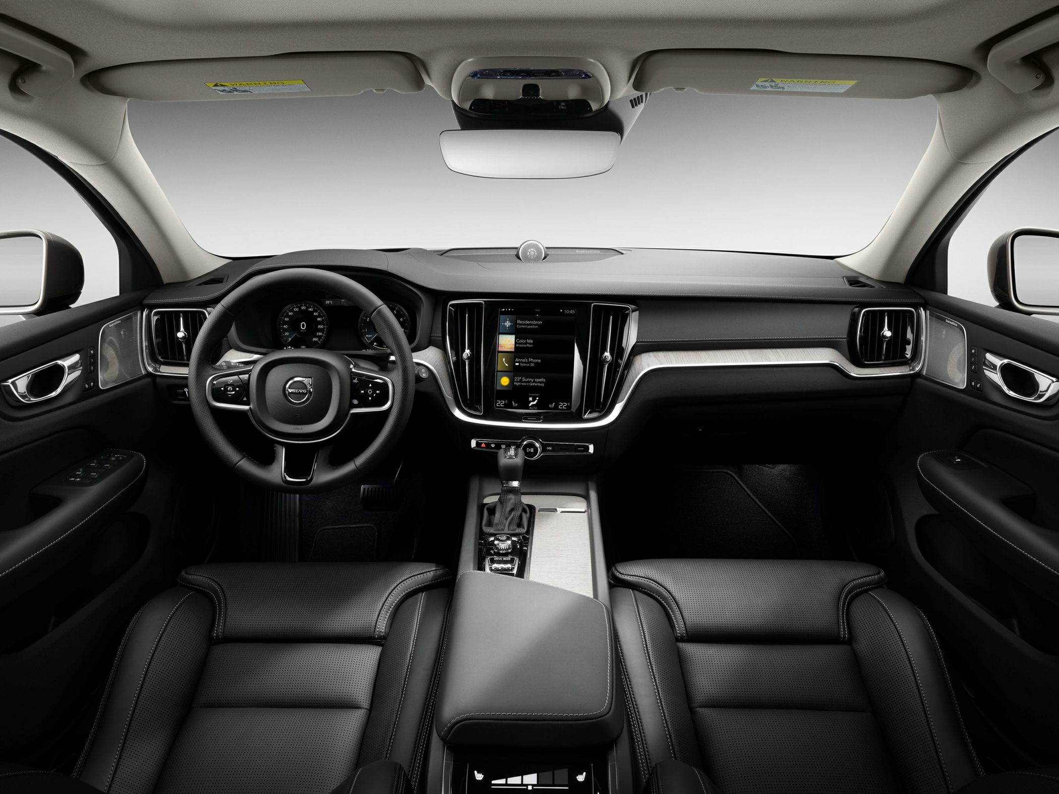 Modern dashboard and center console with digital display and leather seats
