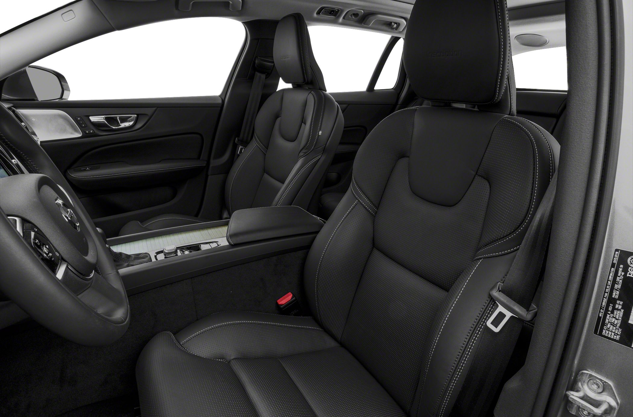 Front seats, steering wheel, and center console with premium leather upholstery
