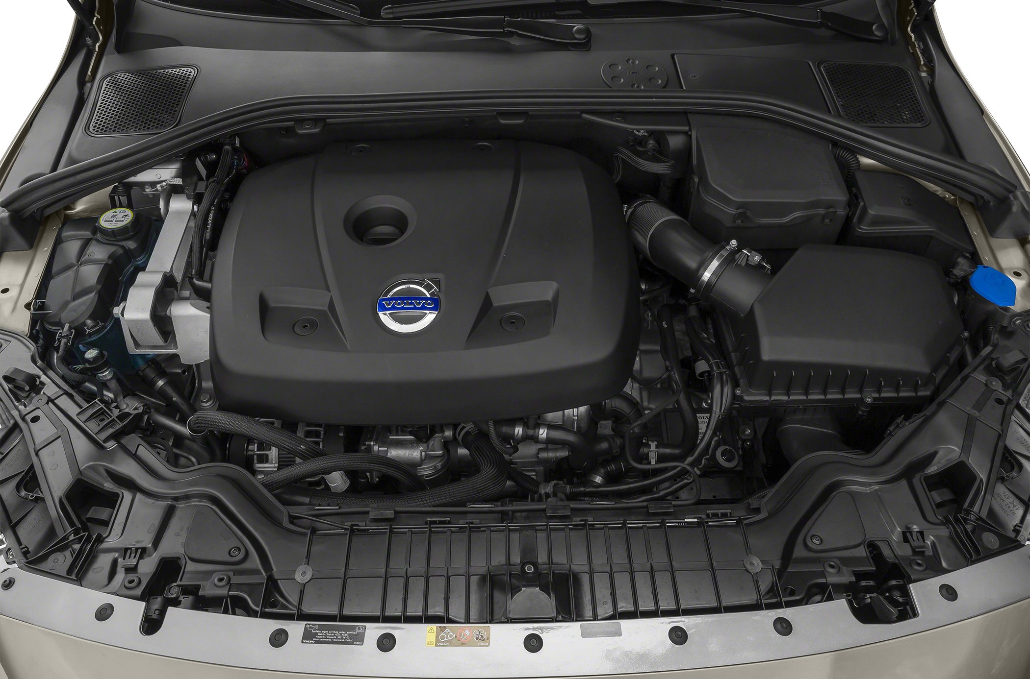 Engine bay with prominent engine cover and surrounding components