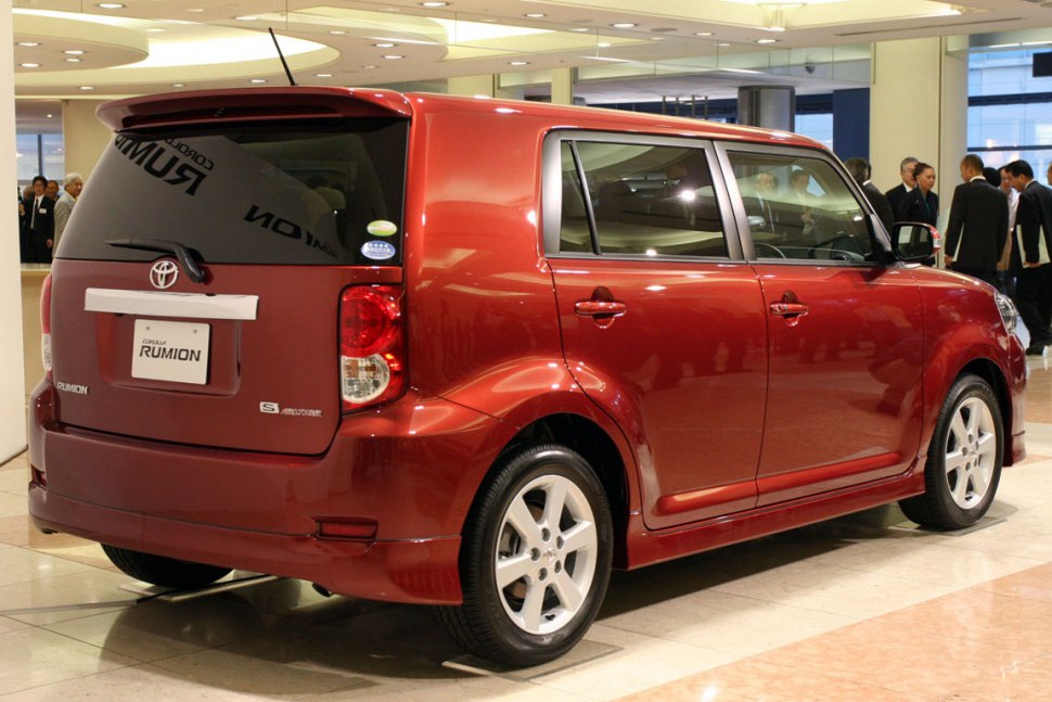 Rear and side view of a boxy compact hatchback with alloy wheels
