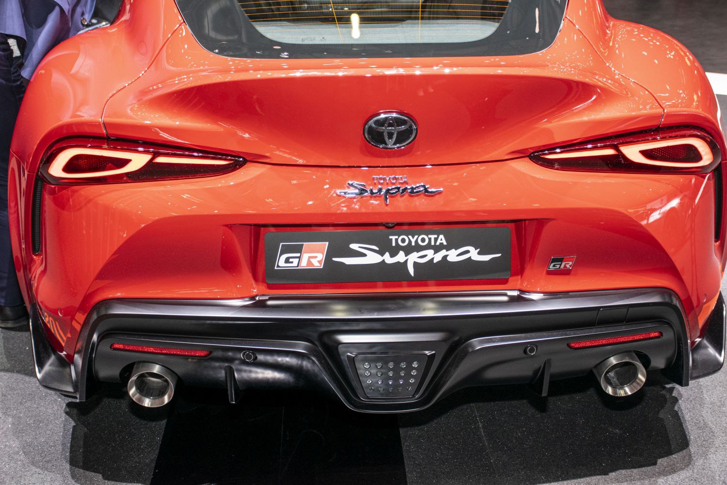 Sporty rear view with LED tail lights and dual exhaust pipes