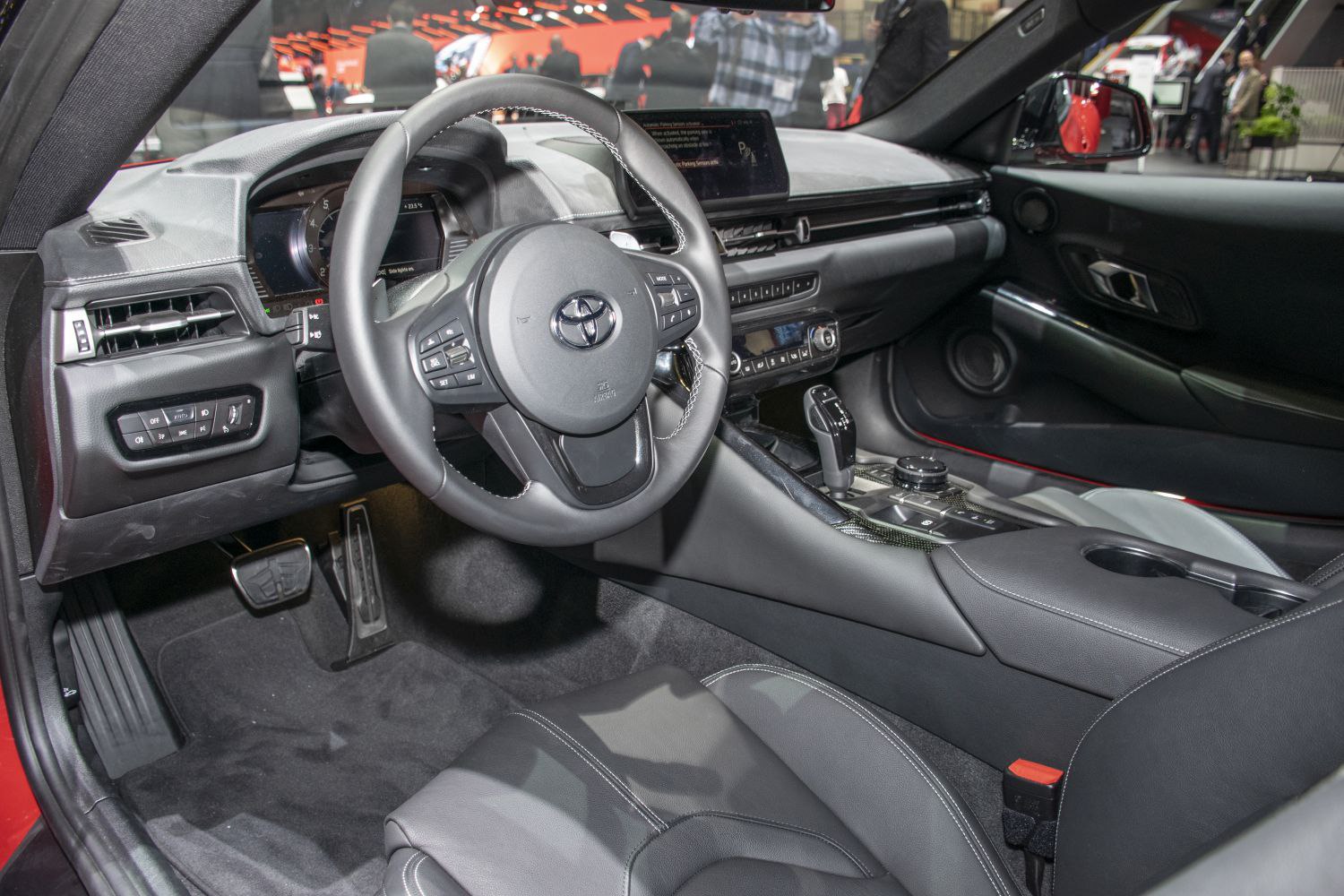 Sporty dashboard and steering wheel with modern controls