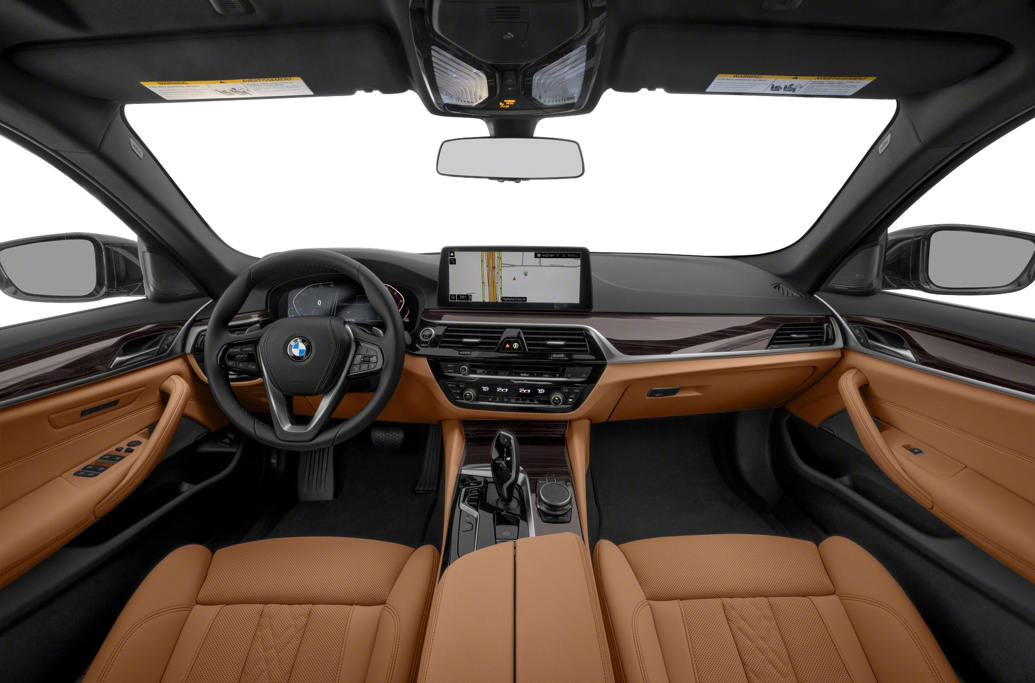 Luxury car interior with dashboard, infotainment screen, steering wheel, and brown leather seats