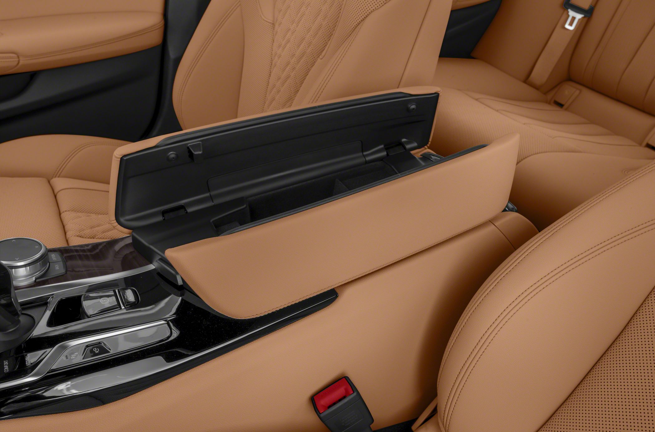 Tan leather center console storage compartment and interior details