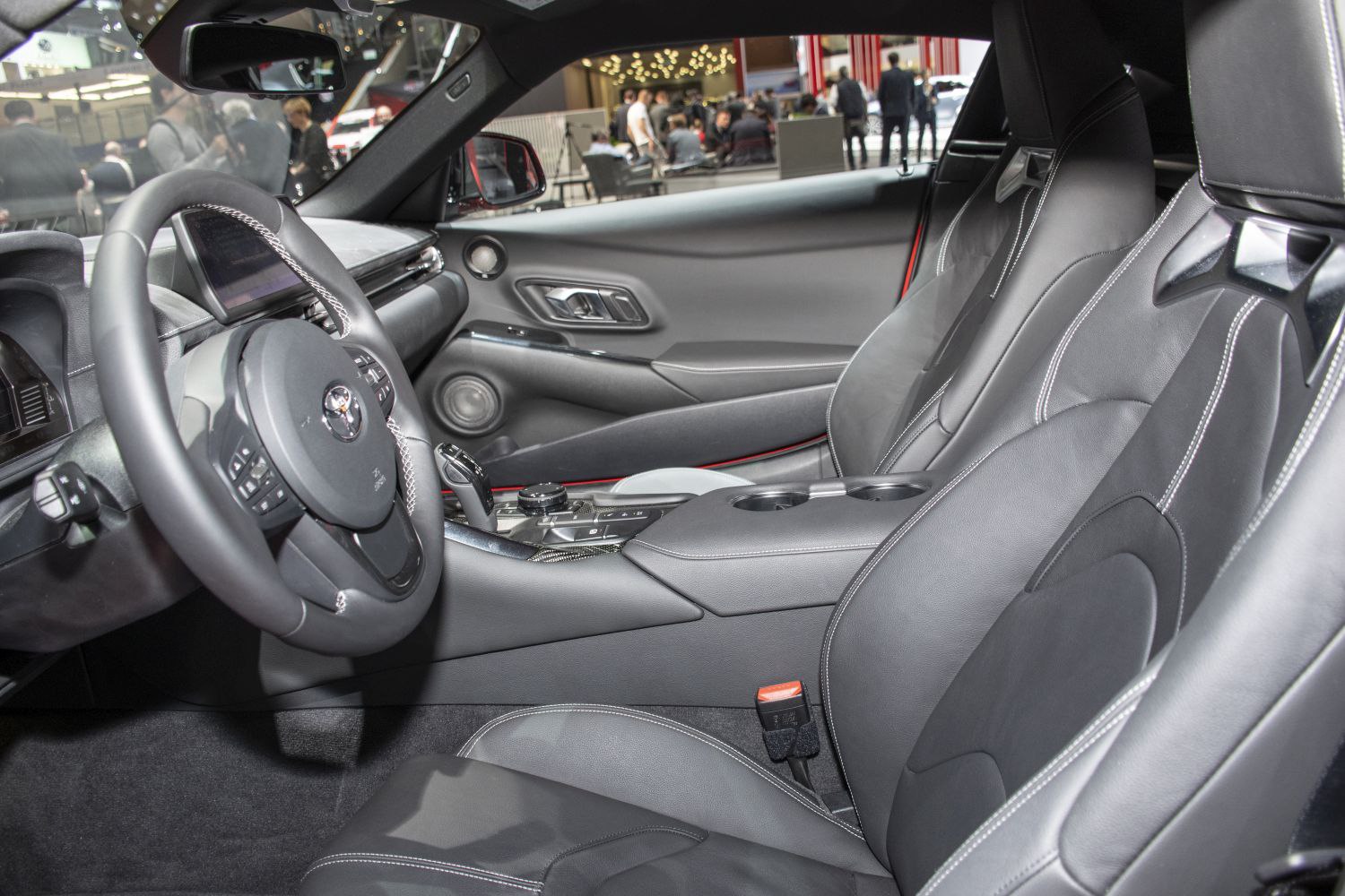 Sports car interior with leather seats and modern controls