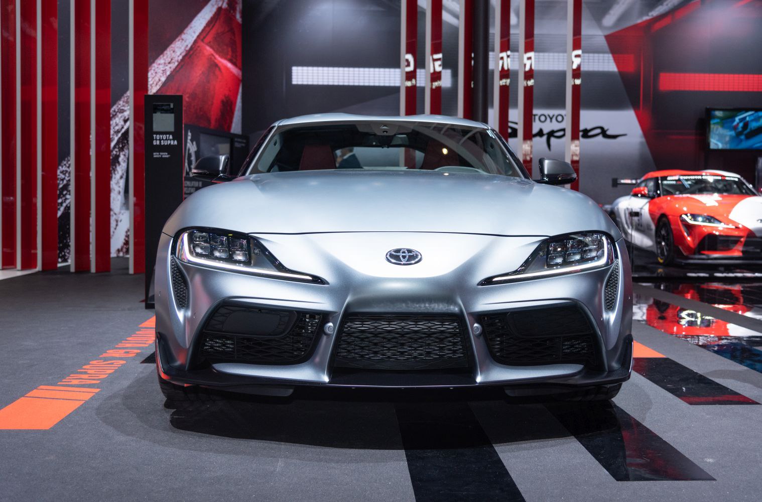 Front view with sharp LED headlamps and aggressive air intakes