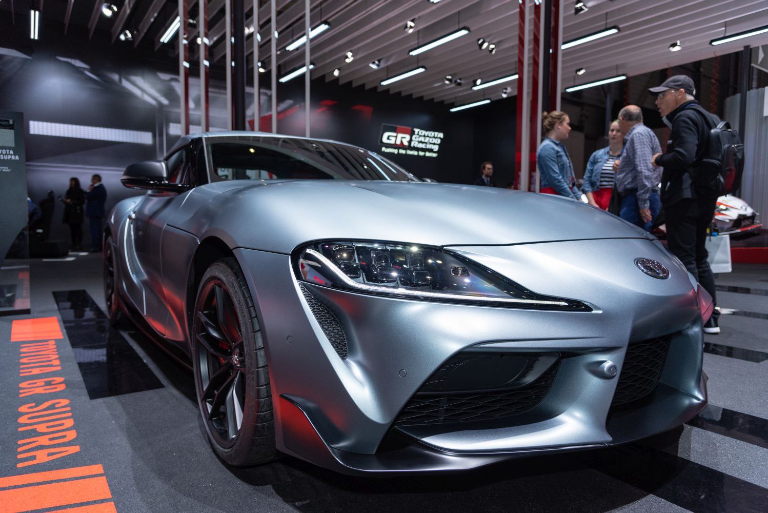Front bumper, LED headlights, and sporty wheel of a sleek modern sports car