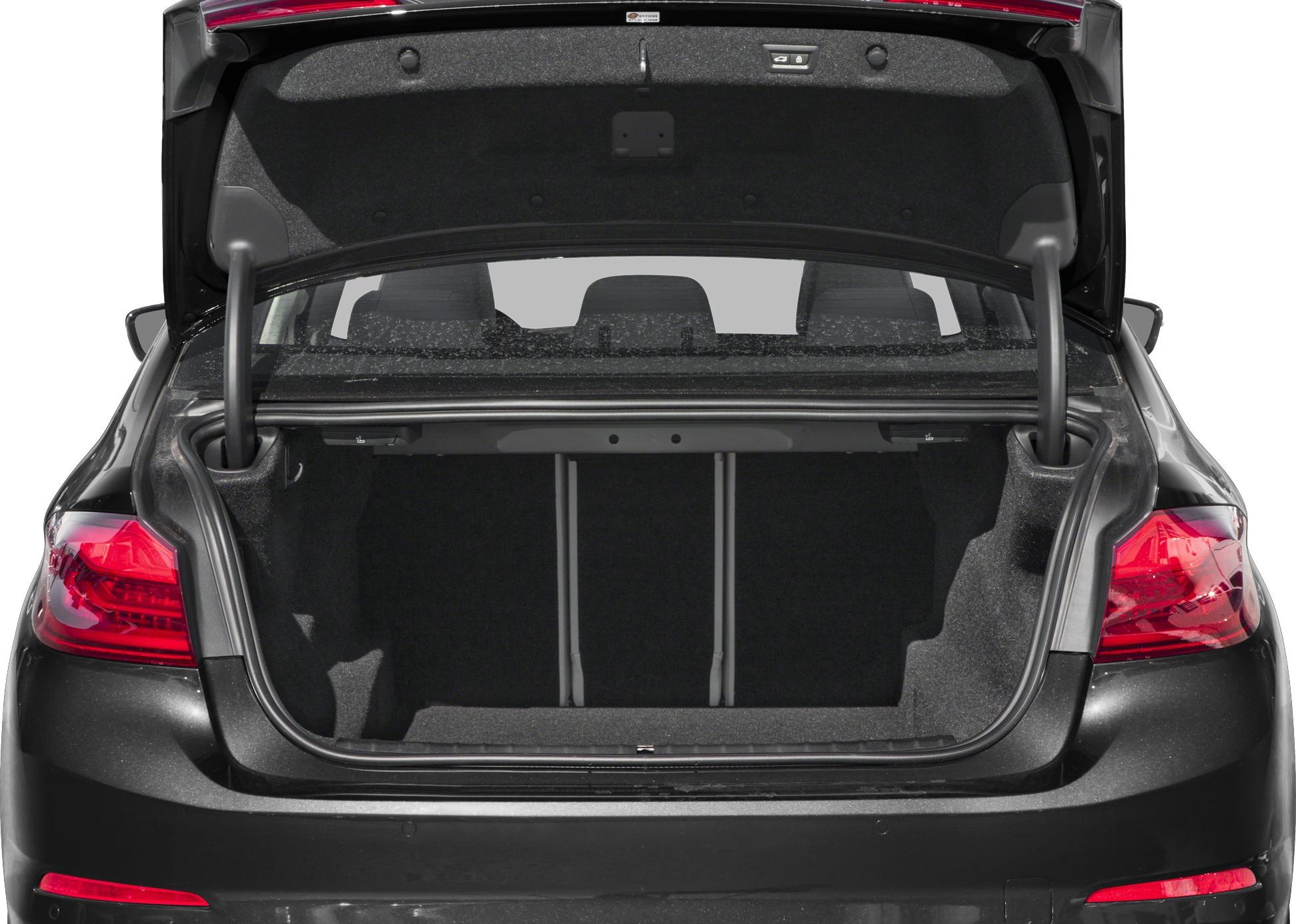 Open trunk with spacious, carpeted cargo area and rear seat pass-through