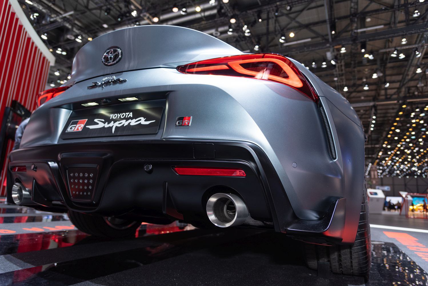 Sporty rear with sleek tail lights and stainless steel exhaust tip