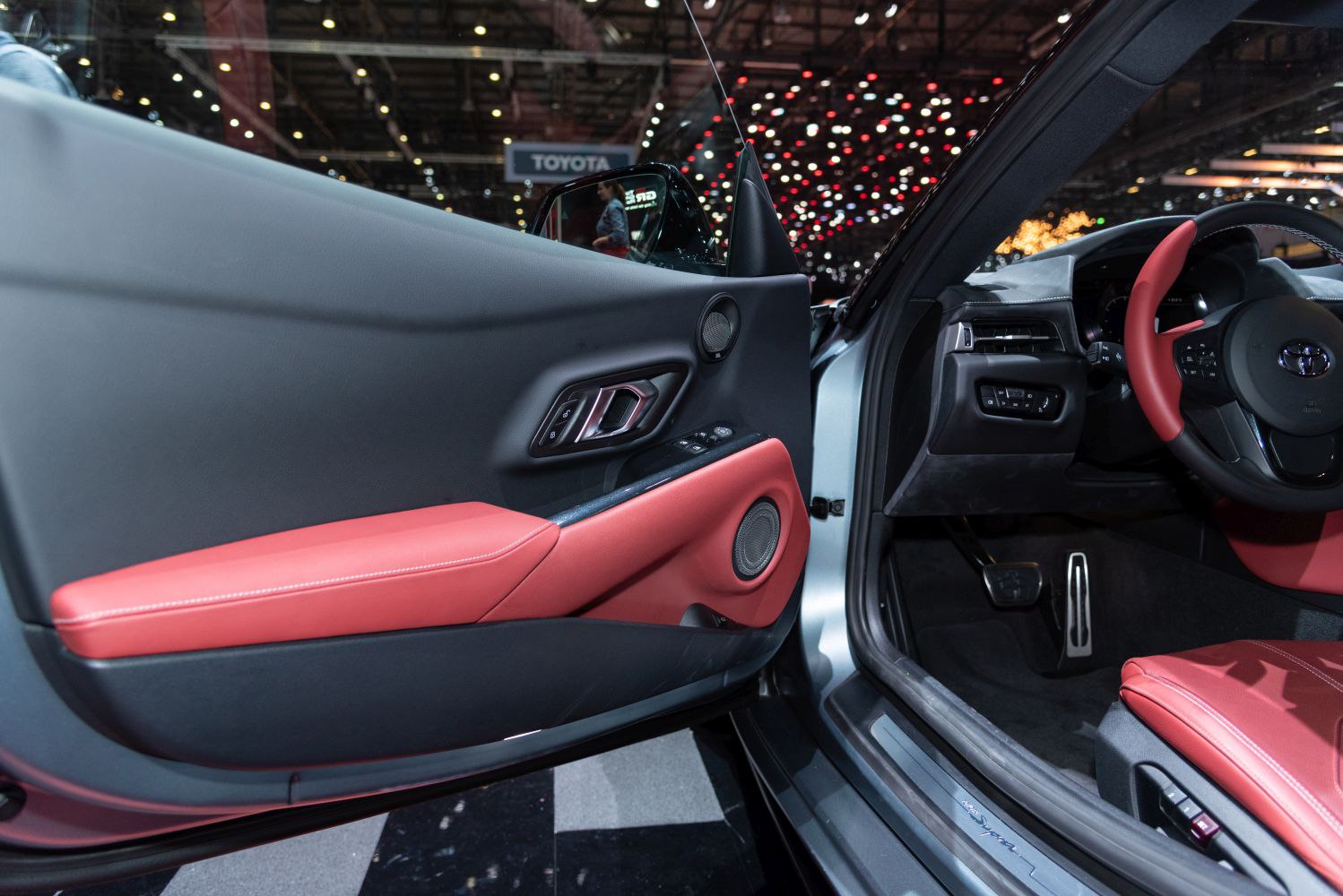 Red leather interior door panel and steering wheel details